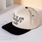 Add festive humor to your look with the Put It on Santa’s Tab baseball cap, a playful embroidered hat perfect for holiday parties, casual outings, or gifting. A fun seasonal accessory that spreads cheer while keeping your style relaxed and trendy.