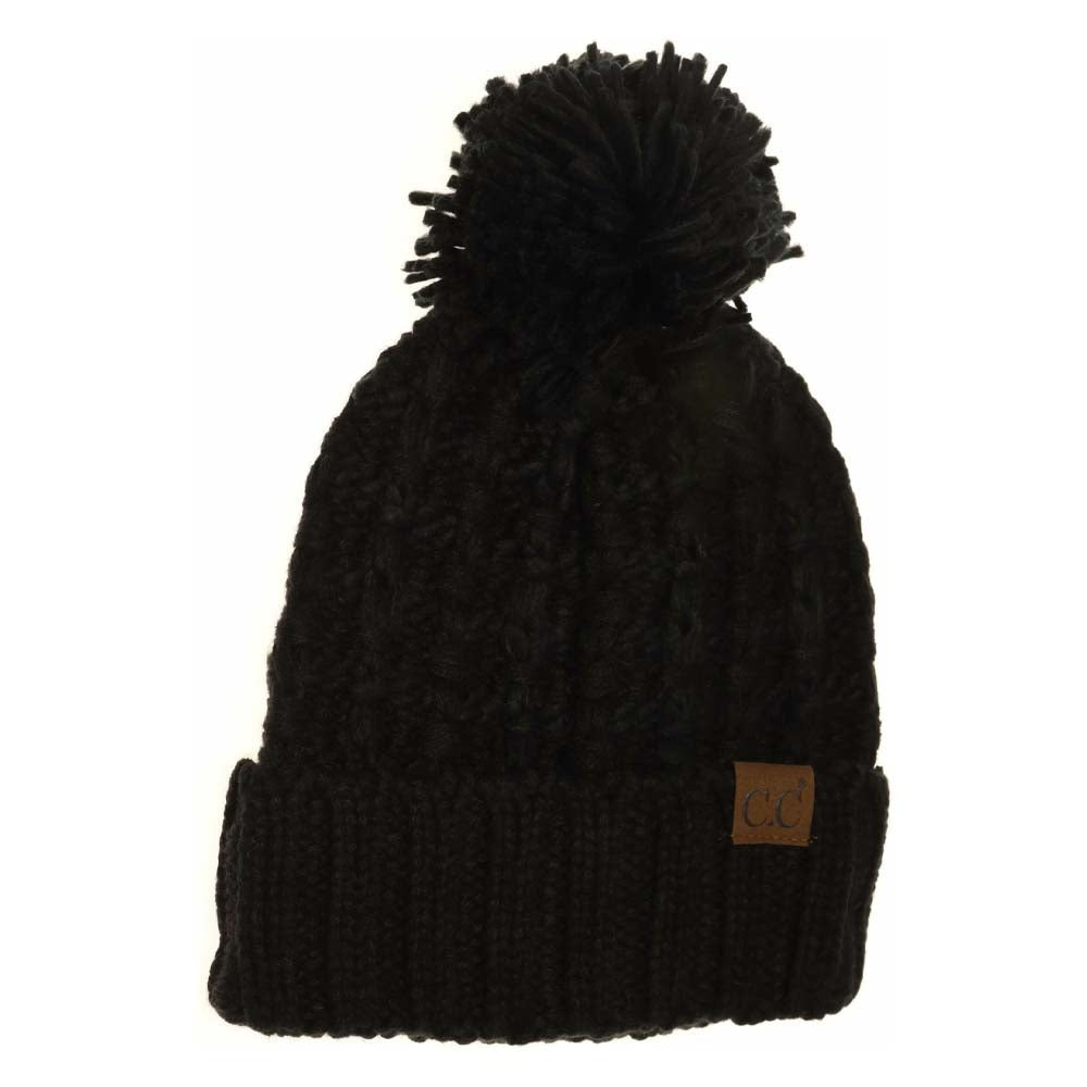 Black Slipstitch Pom Beanie expertly blends functional warmth with refined design. Crafted with a textured slipstitch knit, it ensures durability and a snug fit while maintaining breathability. The added pom offers a subtle yet distinctive accent, making this beanie an essential piece for both outdoor protection and polished winter style. 