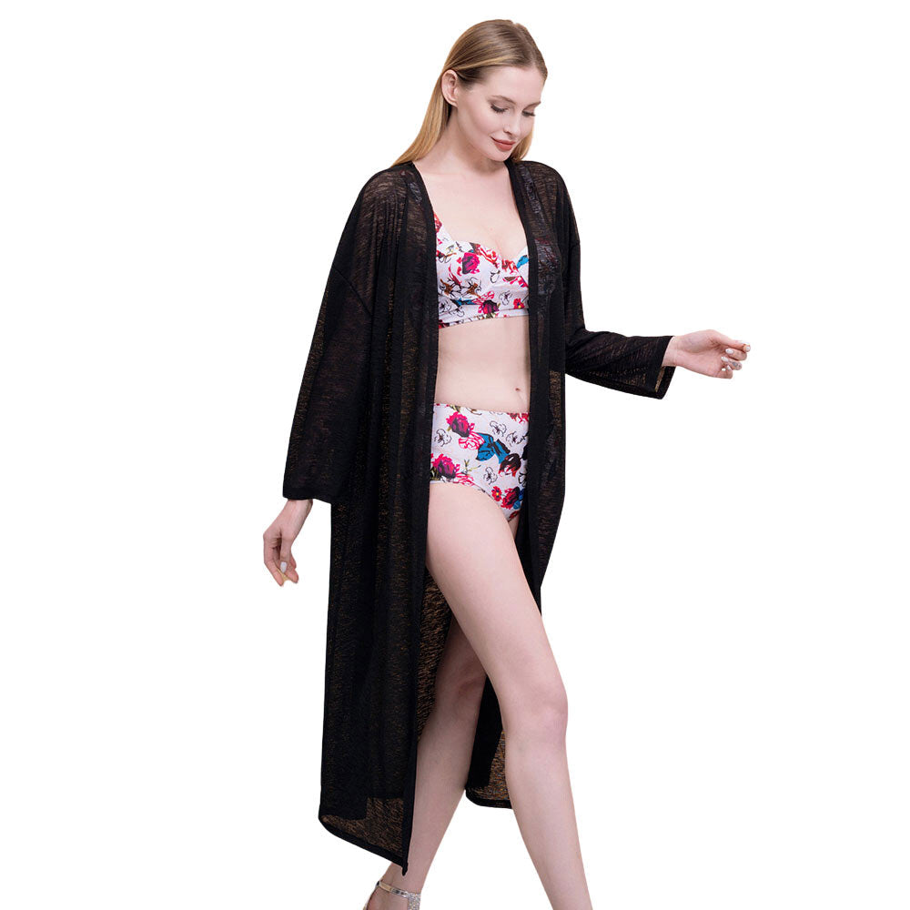 Black Solid Cover Up Kimono Poncho, this timeless cover-up kimono poncho is Soft, Lightweight, and breathable fabric, close to the skin, and comfortable to wear. Sophisticated, flattering, and cozy. Look perfectly breezy and laid-back as you head to the beach. Can even be used as a beach bathing suit wrap. 