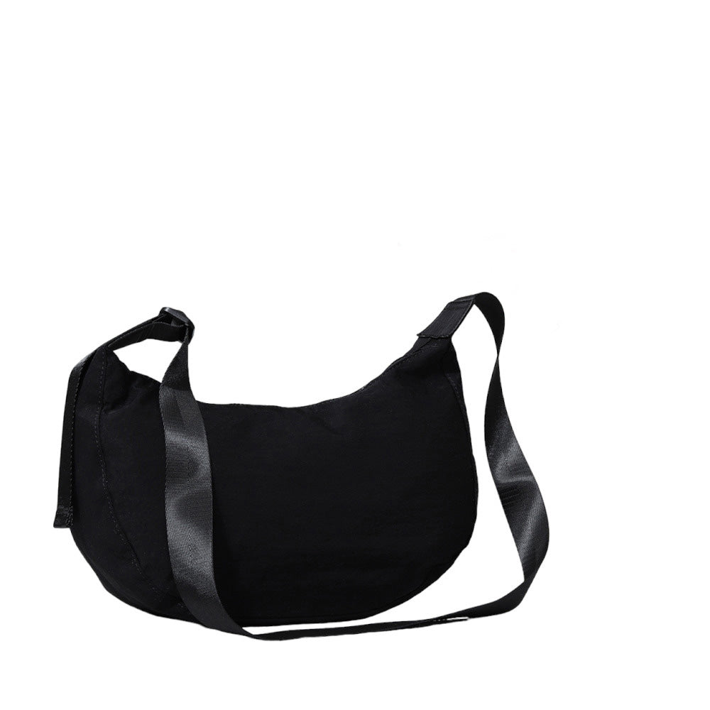 Black Solid Nylon Sling Bag Crossbody Bag, is perfect to carry all your handy items with ease. This handbag features a top zipper closure for security that makes your life easier and trendier. This is the perfect gift idea for a birthday, holiday, Christmas, anniversary, Valentine's Day, etc.