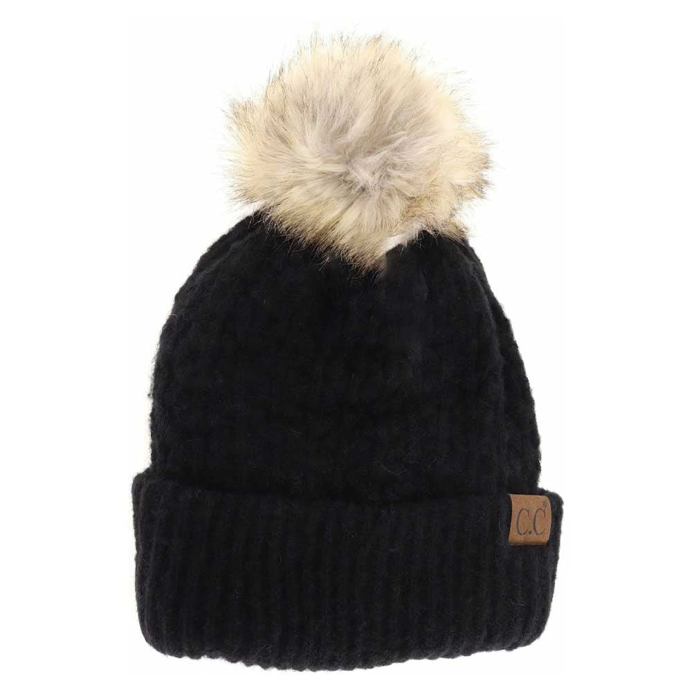 BlackSolid Smocked Stitch Fur Pom C.C Beanie combines expert craftsmanship with functional winter style. Featuring a tightly smocked stitch pattern, this beanie ensures durability and a comfortable fit. The luxurious fur pom adds a refined accent, elevating this essential cold-weather accessory. Its design provides warmth without bulk, making it an excellent choice for outdoor activities or everyday wear during chilly seasons. 
