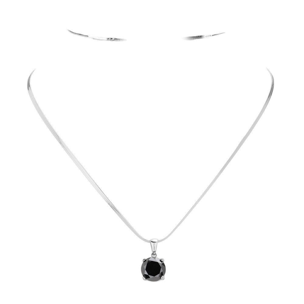 Black Stainless Steel CZ Round Pendant Necklace is a stylish and durable accessory. Crafted from high-quality stainless steel, this necklace is resistant to tarnishing and fading. Featuring a sparkling CZ round pendant, it adds a touch of elegance to any outfit. Upgrade your jewelry collection with this timeless piece. 