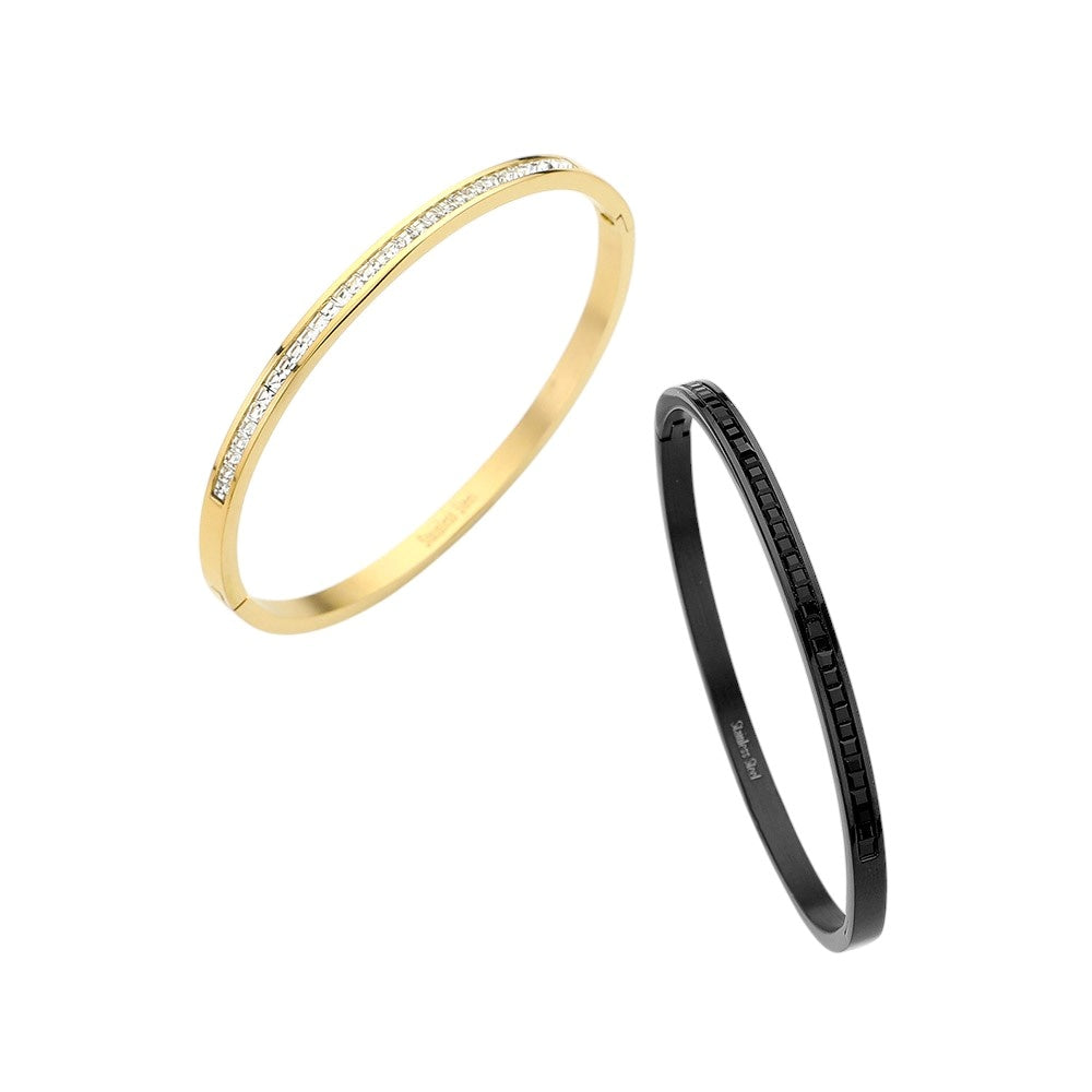 Black Stainless Steel Rhinestone Paved Hinged Bangle Bracelet is durable and stylish for any occasion. Featuring a sleek stainless steel design and sparkling rhinestone accents, this hinged bangle is perfect for adding a touch of elegance to any outfit. With its sturdy construction and eye-catching design, this bracelet is a must-have for any fashion-forward individual.