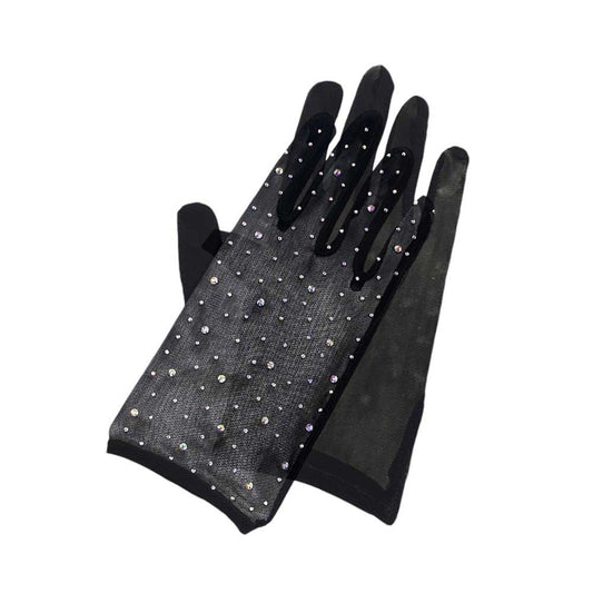 Black-Stone Embellished Mesh Dressy Wedding Gloves are the perfect accessory for any bride-to-be. The delicate mesh design is adorned with sparkling stones, adding a touch of elegance to your special day. The gloves provide a classic and stylish look, while also keeping your hands warm during outdoor ceremonies.