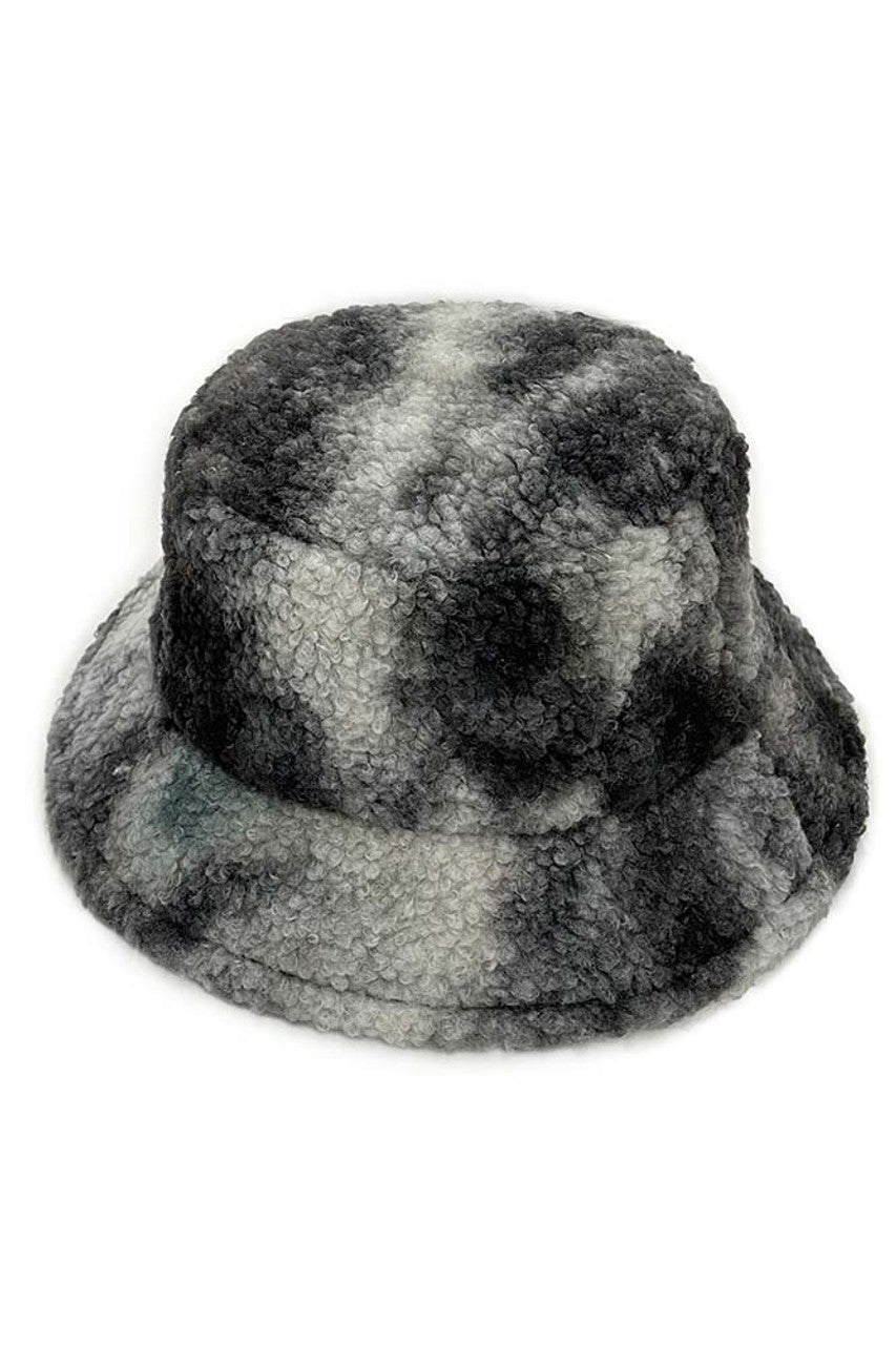 Black Tie Dye Teddy Bucket Hat combines playful aesthetics with practical sun protection. Each hat features a unique tie-dye pattern and adorable teddy bear embellishment, creating a statement accessory that elevates casual outfits. Constructed with quality materials for durability and comfort during extended wear.