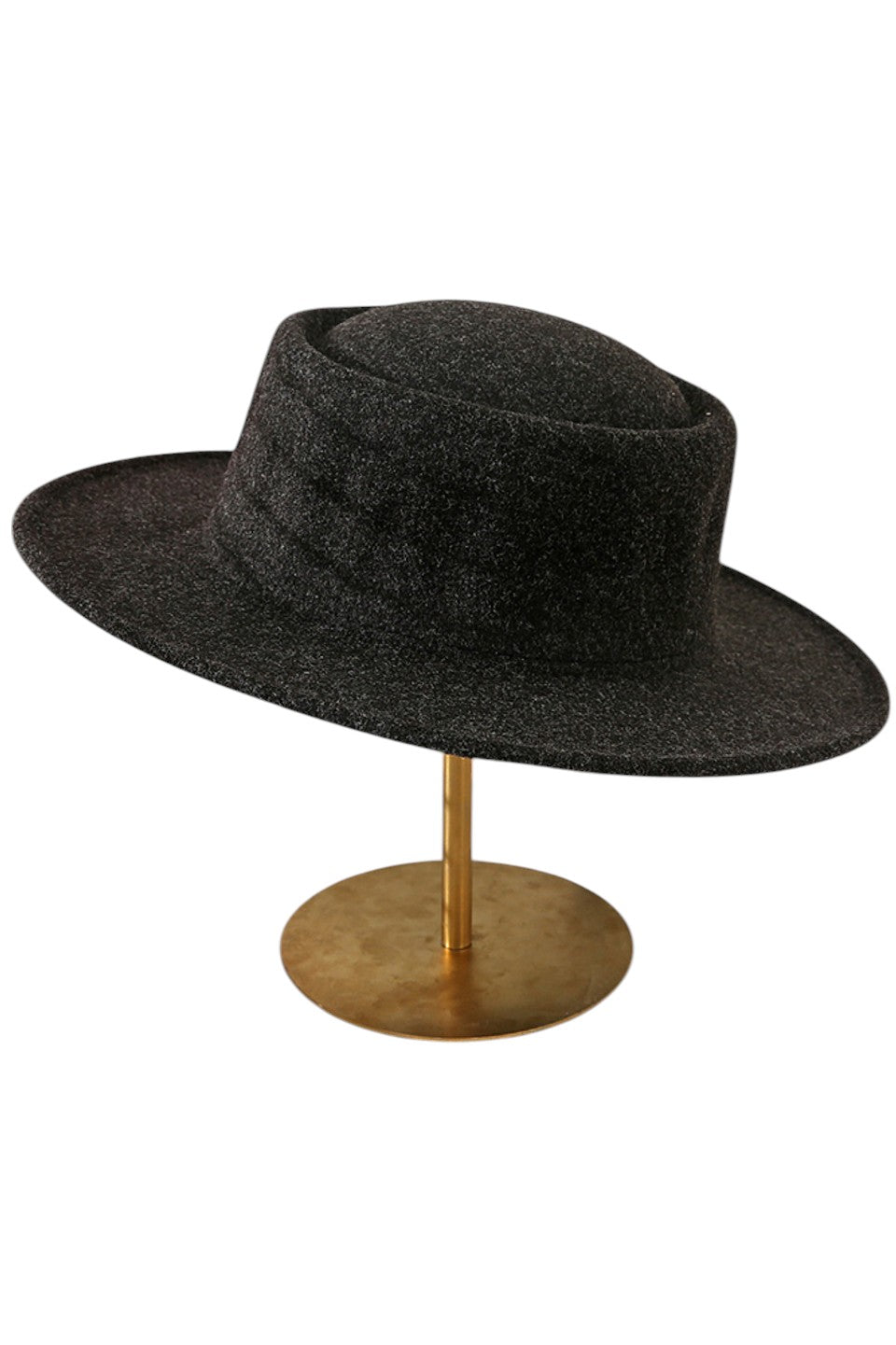 Black Wool felt fedora represents superior millinery engineering through its precise material composition and structural design. The densely felted wool fibers create exceptional resilience while maintaining a lightweight wearing experience. The architectural crown features calculated dimensions with strategic creasing, ensuring consistent shape retention. The proportional brim offers effective protection from elements while maintaining aesthetic balance.