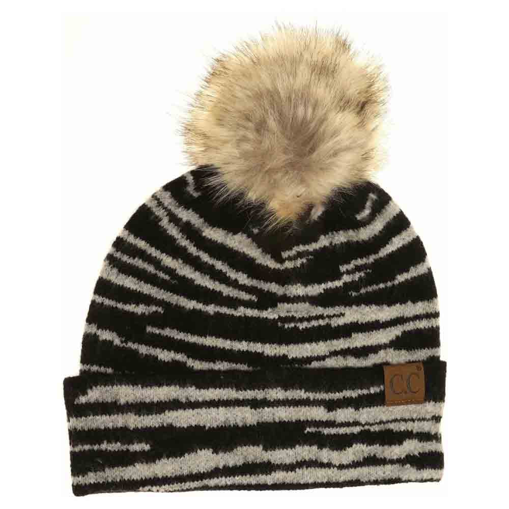 Black Zebra Pattern Faux Fur Pom Beanie offers a refined blend of style and warmth. Made from high-quality faux fur, it features a distinctive zebra print that elevates your winter accessories. The soft pom adds volume and a fashionable touch, while the beanie’s design ensures a comfortable, secure fit. Ideal for those seeking expert-level winter wear with a bold, animal-inspired aesthetic. 
