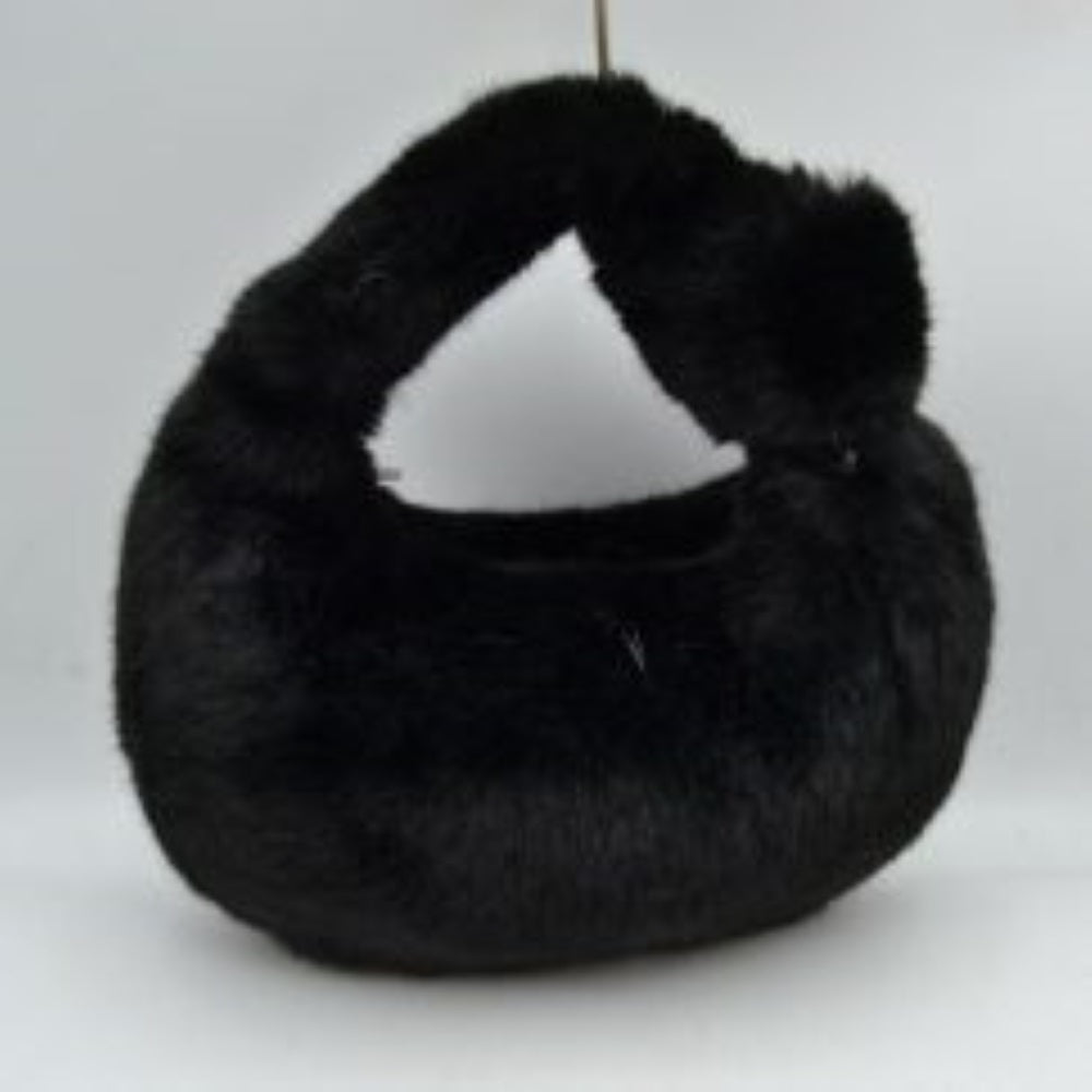 Black This hobo-style handbag features a distinctive fluffy, textured plush exterior that wraps entirely around the body and handle for a soft finish. Designed for effortless everyday use, it showcases a curved crescent silhouette with a wide, integrated top handle that fits comfortably in the hand or on the arm. An open-top entry provides quick access to the main storage compartment, making it a playful yet practical accessory for carrying daily essentials.