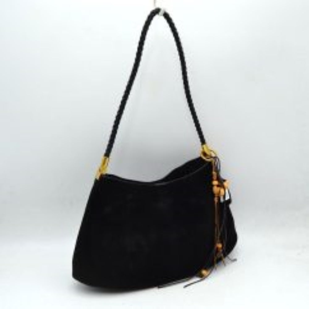 Black This structured shoulder bag presents a clean, smooth finish and a classic square silhouette that makes it an excellent choice for everyday use. It features a wide, flat shoulder strap attached securely to the sides to offer a comfortable carry over the shoulder. The open top design reveals a spacious main compartment for storing larger items, accompanied by a separate, removable inner pouch with a secure metallic zipper closure to keep smaller essentials organized.
