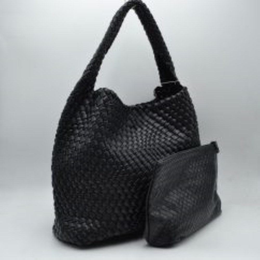 black This chic, slouchy shoulder bag features an intricate basket-weave design in a creamy off-white tone, offering a highly textured and relaxed silhouette for stylish everyday use. It is crafted with an integrated wide, woven top handle that extends seamlessly from the main body panels for comfortable over-the-shoulder carrying. The spacious open-top main compartment provides effortless access to your items and comes complete with a matching