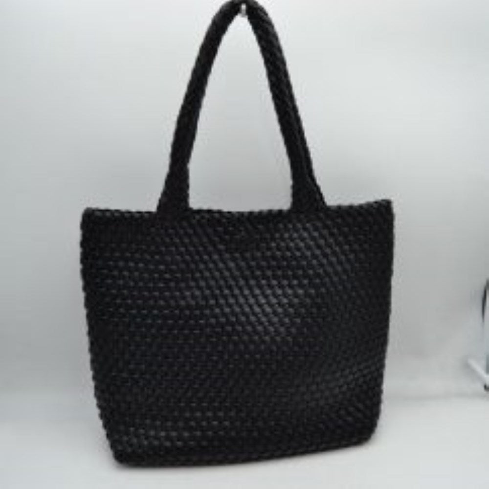 Black This structured tote bag features an intricate basket-weave design across its body and integrated shoulder straps, creating a textured look suitable for everyday use. The main storage compartment offers a wide, open-top design for easy access to daily essentials. Accompanying the larger bag is a matching smaller pouch with a distinct woven exterior pattern and a secure gold-tone top zipper closure to keep smaller items organized.