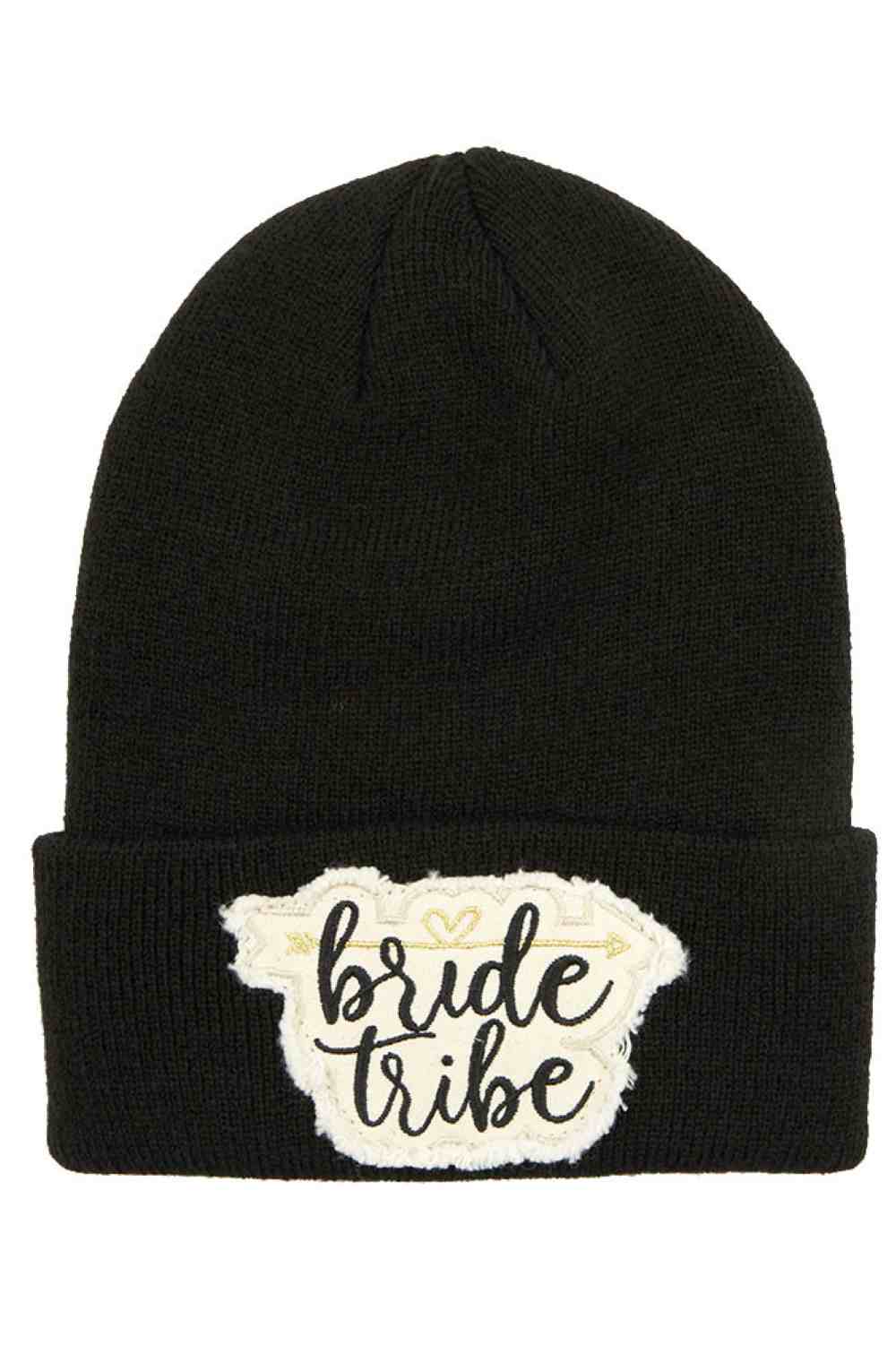 Black The C.C Knitted Cuffed Beanie with Bride Tribe Patch is a cozy, soft knit hat featuring a classic folded cuff and a fun “Bride Tribe” patch detail. Perfect for bachelorette parties, bridal showers, or wedding festivities, it keeps your crew warm while adding a stylish, celebratory touch.
