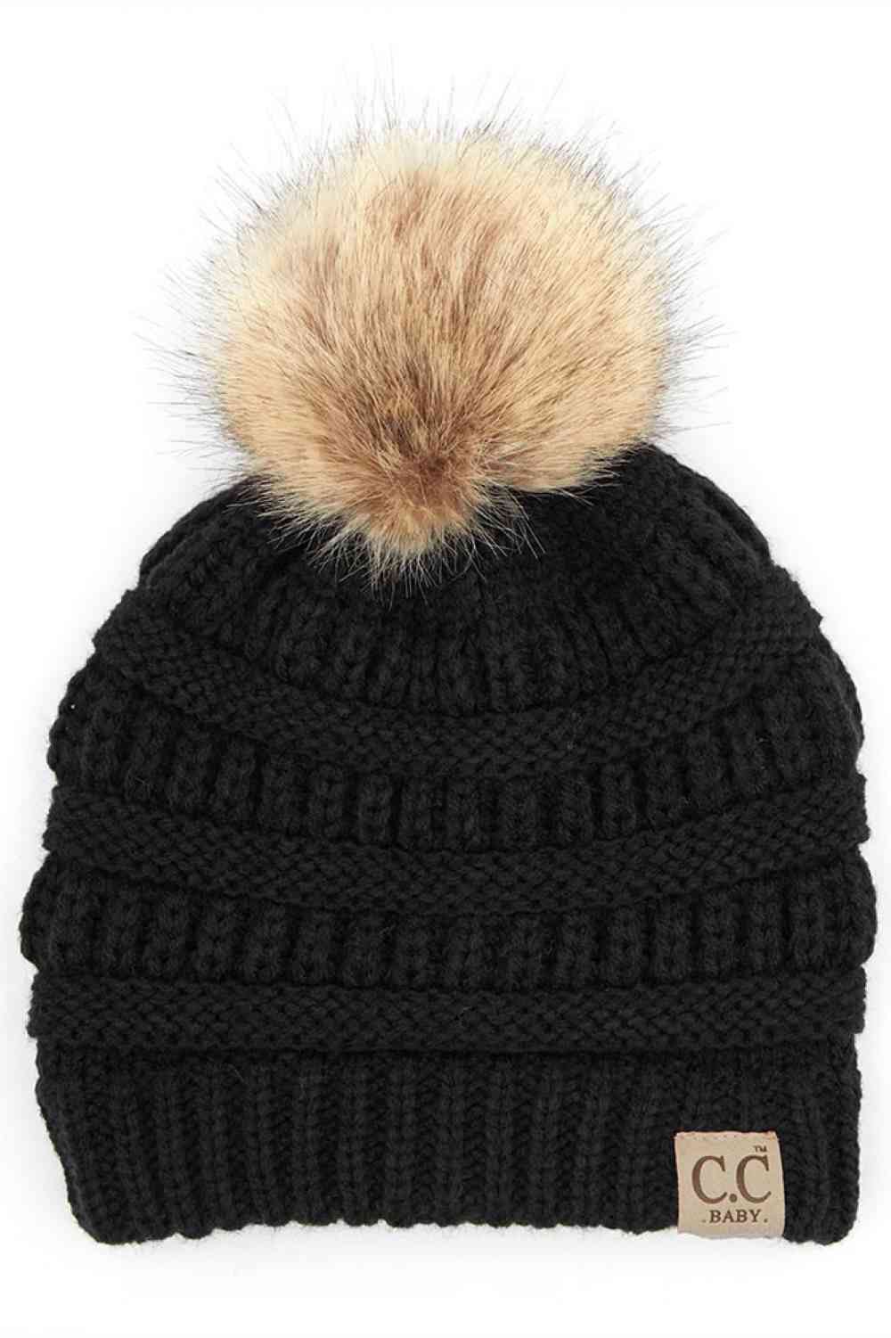 Black Keep your little one warm and cozy with this C.C Solid Ribbed Infant Beanie. Made from 100% acrylic, the soft ribbed knit construction provides gentle comfort against delicate skin while the natural fur pom adds a charming detail.