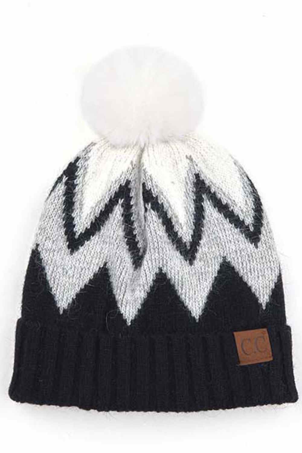 Black Stay warm and stylish with this chevron knit beanie crafted from a premium blend of 70% acrylic and 30% angora. The ribbed construction provides a snug fit, while the fluffy pom pom adds a playful touch. Soft, breathable, and designed to complement any winter look, this versatile beanie is your go-to accessory for cold weather comfort.