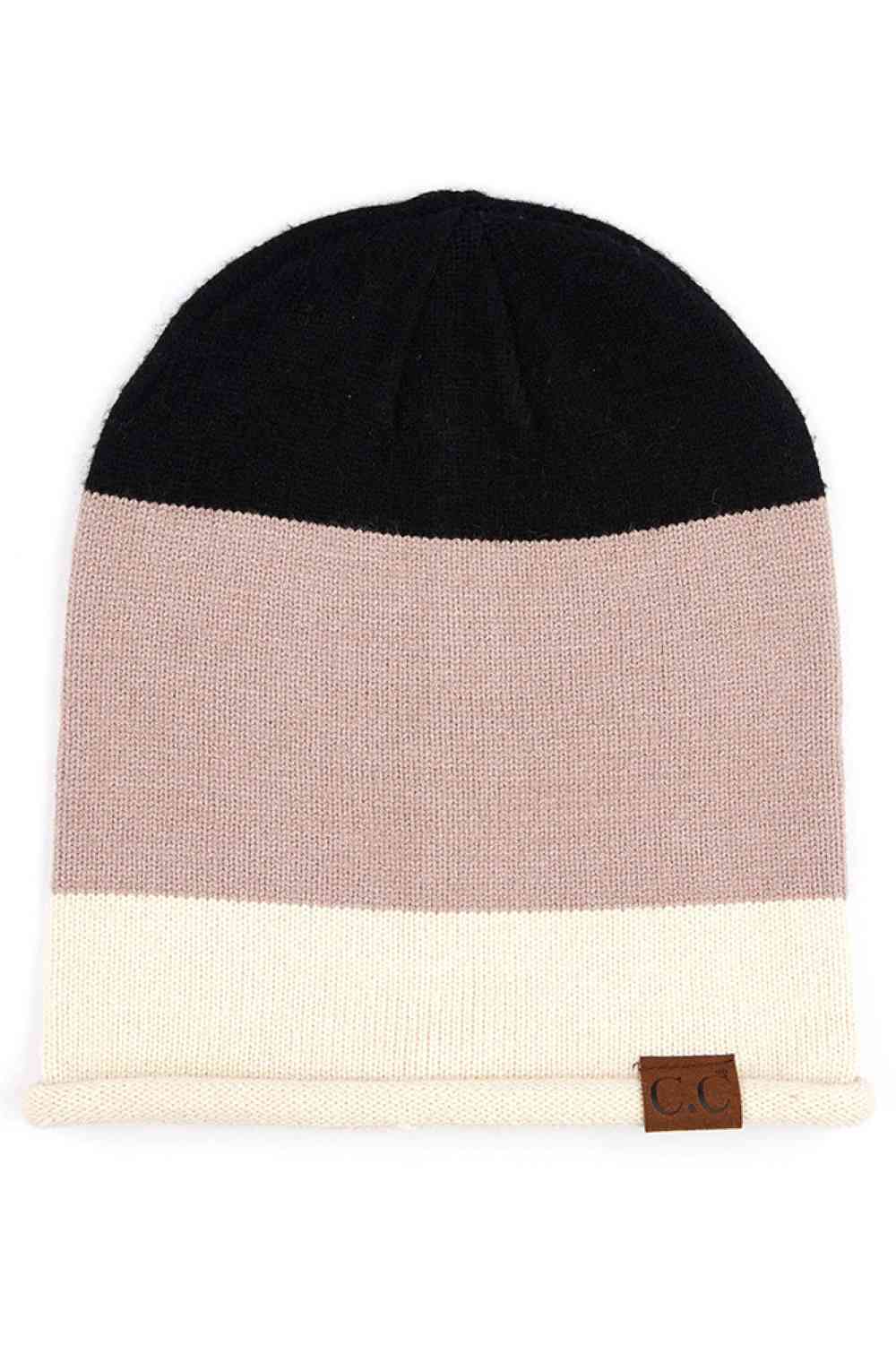 Black Elevate your winter wardrobe with the C.C Colorblock Rolled Cuff Slouchy Beanie, designed for comfort and contemporary style. This relaxed-fit beanie features a striking colorblock design with a rolled cuff that adds visual interest to any outfit. Perfect for chilly days when you want to stay cozy without compromising on style.