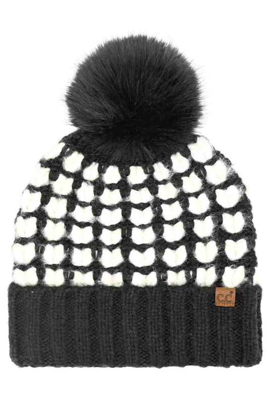Black C.C Full of Heart Pattern Pom Beanie Winter Hat features an adorable heart-knit design topped with a fluffy pom for a cozy, love-filled winter look. Finished with a soft cuff and stretch fit, it delivers warm comfort while adding charming style to your cold-weather outfits.