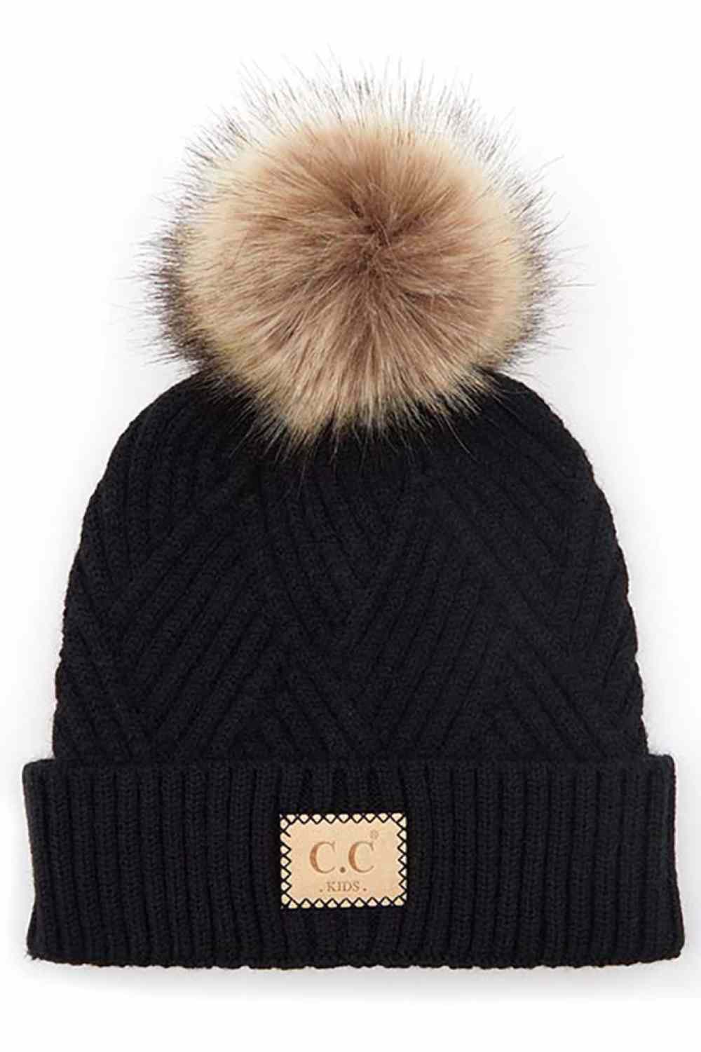 Black Keep your little one cozy with this C.C Kids Knit Beanie, featuring a playful diagonal stripes criss-cross pattern. Crafted from a soft blend of 47% rayon, 31% PBT, and 22% nylon, this beanie offers warmth and durability for everyday wear.