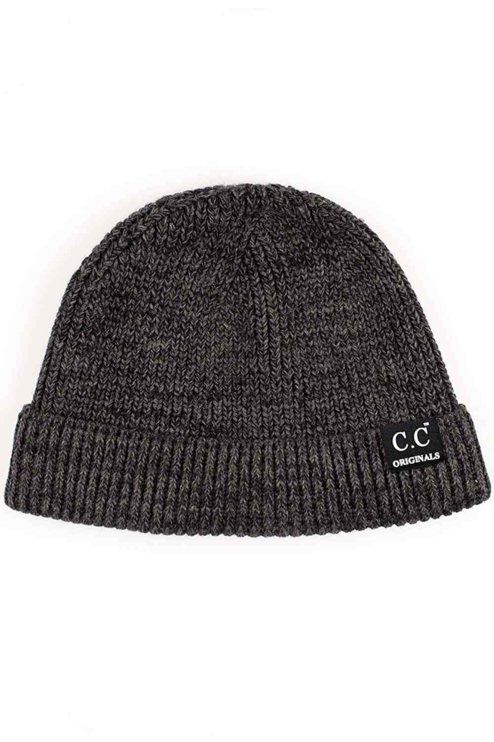 Black The C.C Mixed Tone Short Beanie combines comfort and style with its thoughtfully blended fabric of 45% cotton and 55% acrylic. This versatile beanie delivers warmth without bulk, making it ideal for layering through transitional seasons and everyday wear. The mixed-tone construction adds visual interest while remaining neutral enough to coordinate with any outfit.&nbsp;