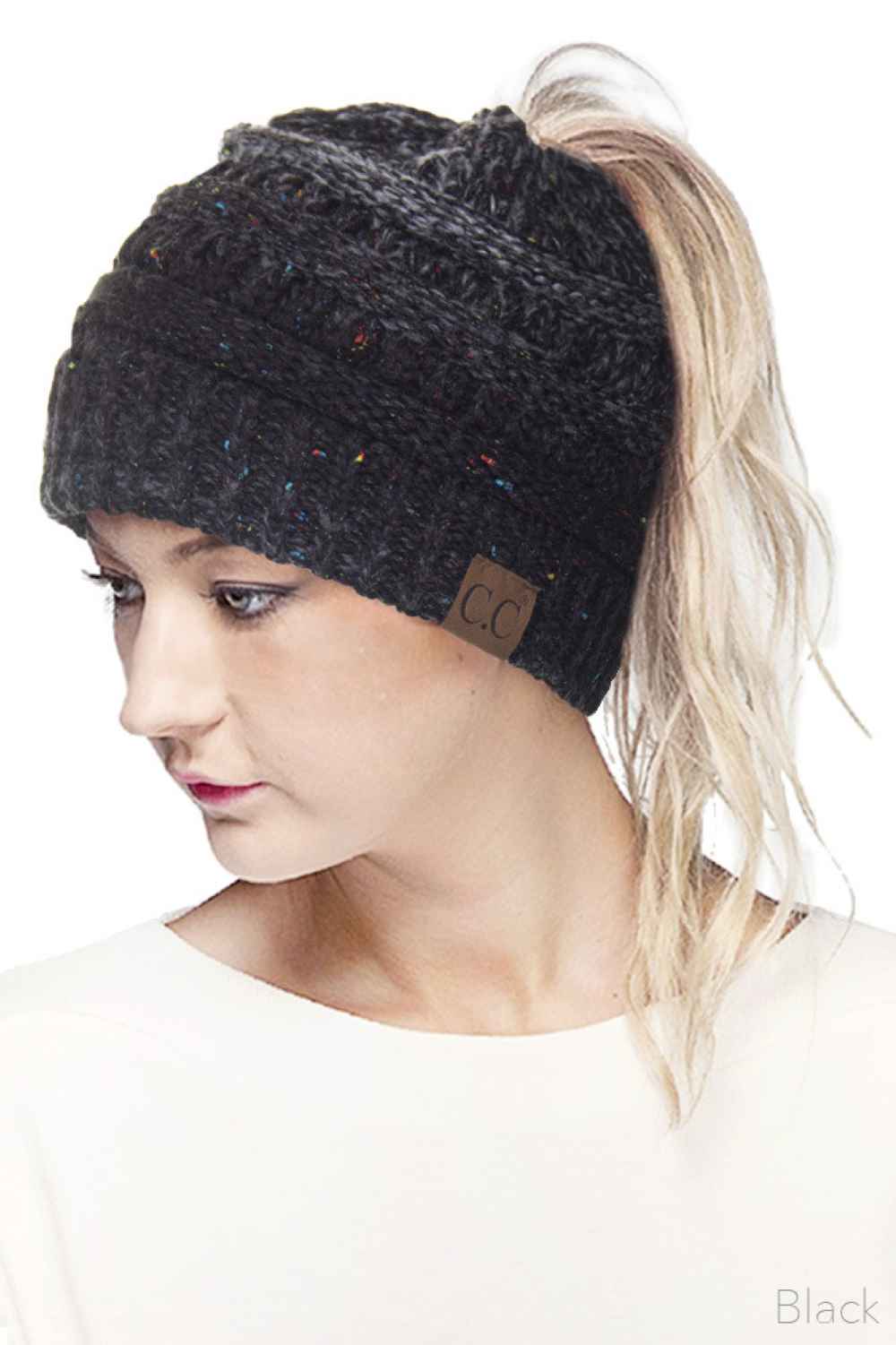 Black Stay cozy and stylish with the C.C Ombre Confetti Messy Bun Ponytail Beanie. Crafted from 100% acrylic, this versatile beanie features a trendy messy bun opening that lets you wear your hair down while staying warm. The soft, stretchy fabric provides all-day comfort and durability, making it perfect for casual outings or outdoor adventures.&nbsp;