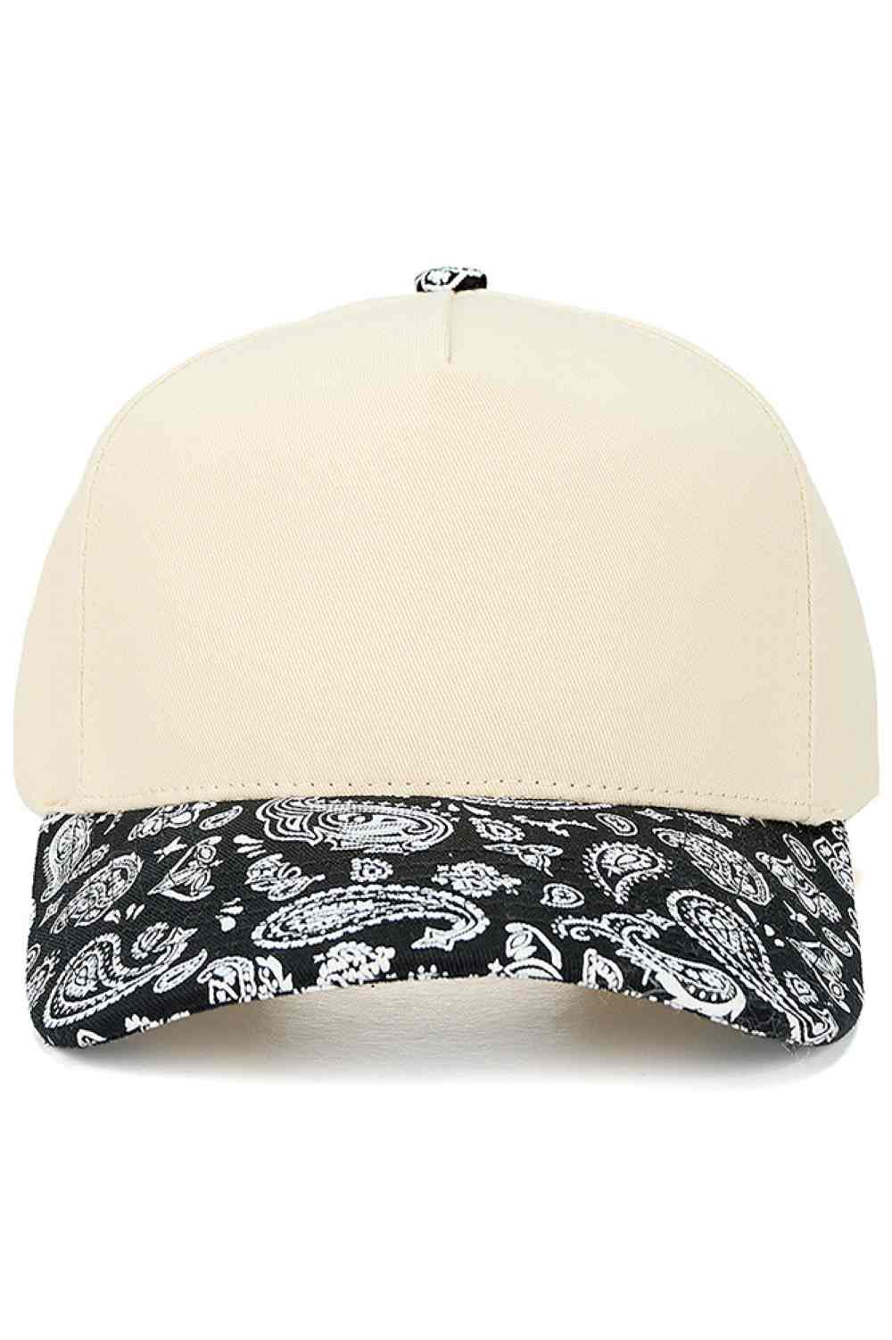 Black Rock a timeless look with the C.C Paisley Pattern Two Tone Trucker Cap. This classic snapback combines breathable 100% cotton construction with a distinctive paisley design and contrasting two-tone colorway. The adjustable snapback closure ensures a comfortable fit for most head sizes, with a 22.5" circumference. Perfect for casual outings, outdoor activities, or everyday style, this versatile cap transitions seamlessly from day to night. Quality crafted in Vietnam, it's a wardrobe staple that complem
