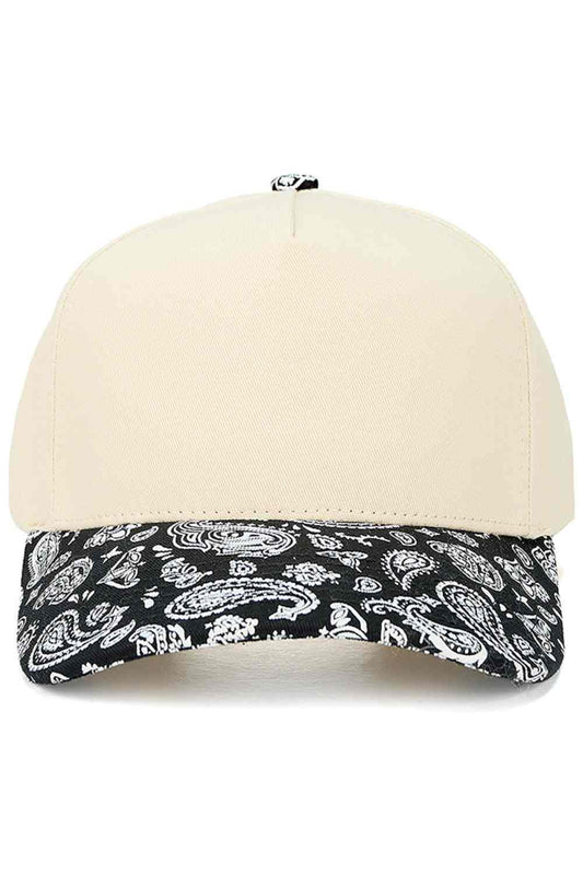 Black Rock a timeless look with the C.C Paisley Pattern Two Tone Trucker Cap. This classic snapback combines breathable 100% cotton construction with a distinctive paisley design and contrasting two-tone colorway. The adjustable snapback closure ensures a comfortable fit for most head sizes, with a 22.5" circumference. Perfect for casual outings, outdoor activities, or everyday style, this versatile cap transitions seamlessly from day to night. Quality crafted in Vietnam, it's a wardrobe staple that complem