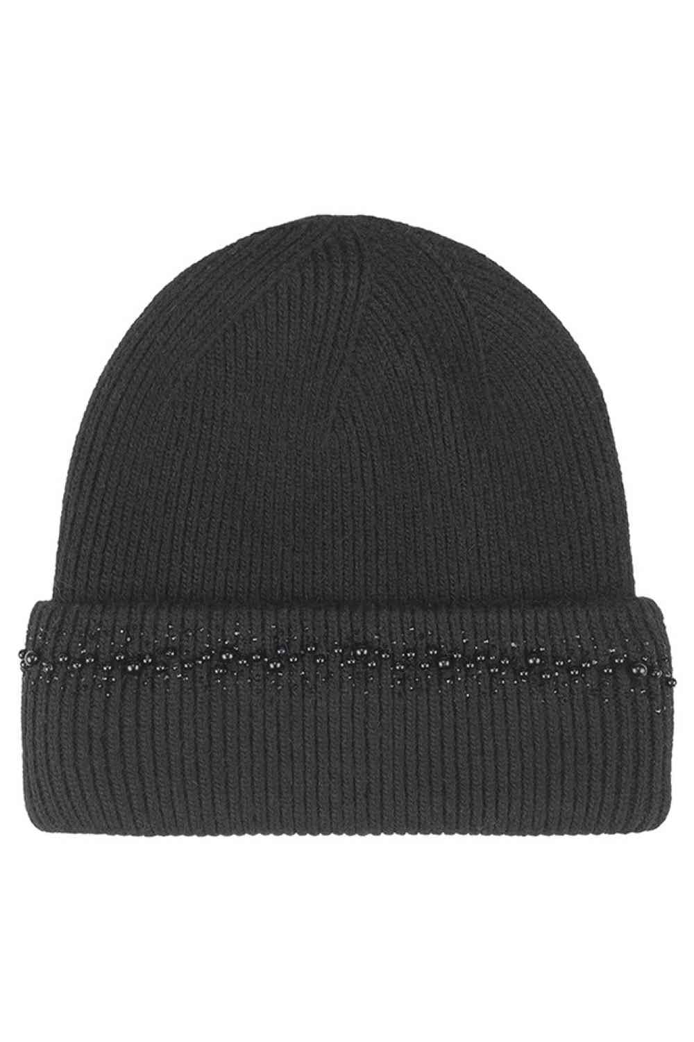 Black C.C Pearl and Rhinestone Angora Cuff Beanie features soft angora knit accented with elegant pearls and sparkling rhinestones for a chic, winter-ready look. Finished with a cozy cuff and stretch fit, this beanie delivers warm comfort while adding instant glam to any cold-weather outfit.