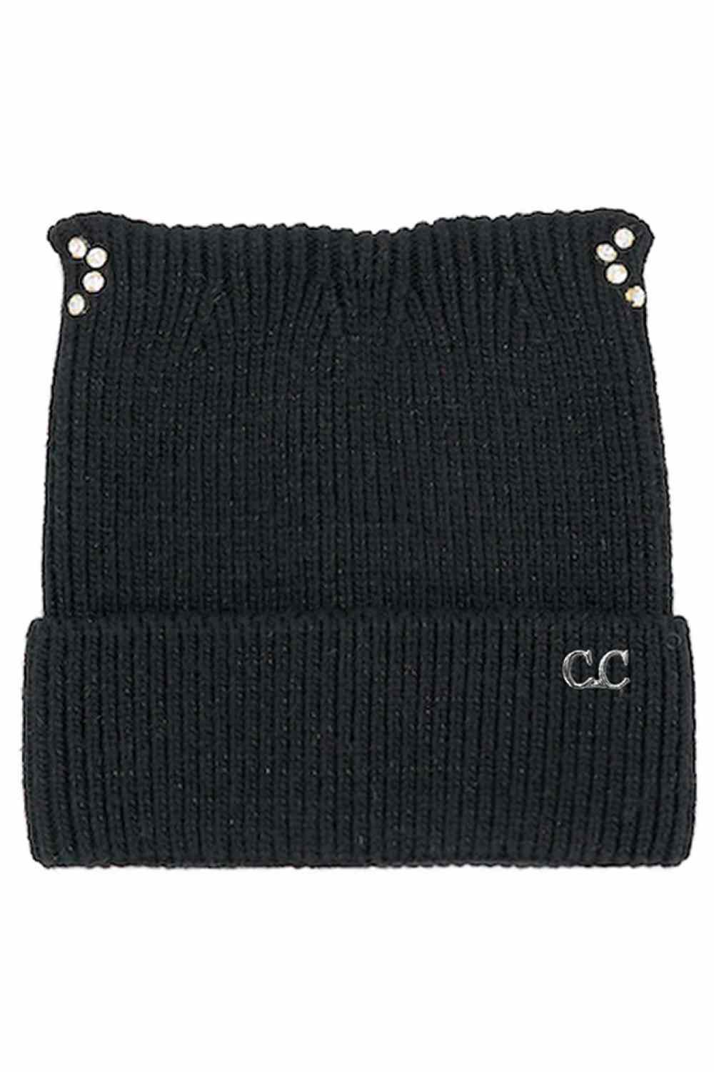 Black C.C Rhinestone Cat Ear Cuff Beanie Winter Hat adds playful charm with sparkling rhinestone accents and cute cat-ear detailing for a fun cold-weather statement. Made for cozy warmth and a comfy stretch fit, this beanie keeps you stylish while staying snug all season.