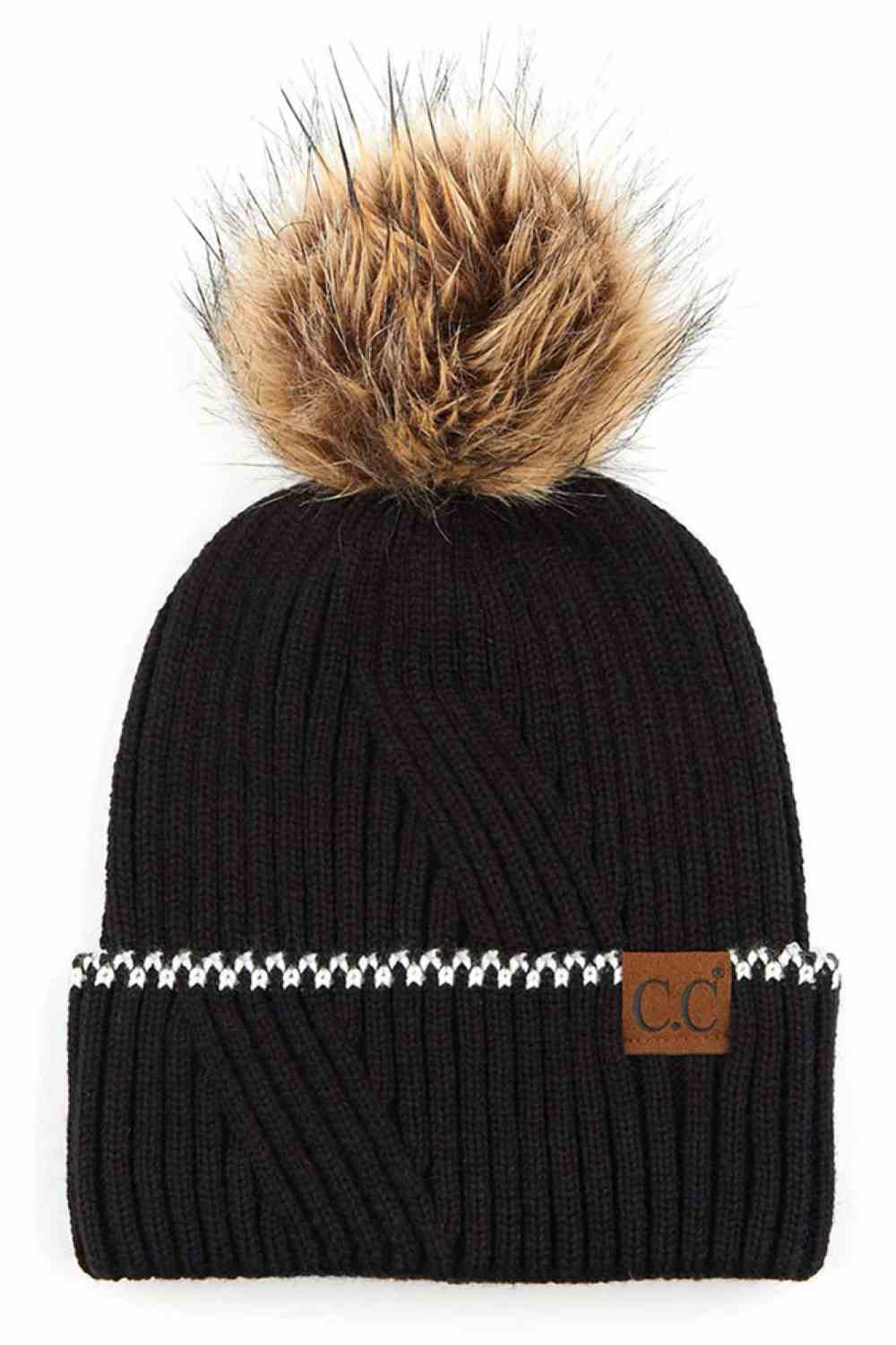 Black C.C Solid Pom Beanie with Accented Cuff Stay warm and stylish with this classic C.C solid pom beanie, designed for everyday comfort. Made from 100% acrylic, this lightweight knit offers softness and durability through winter seasons.