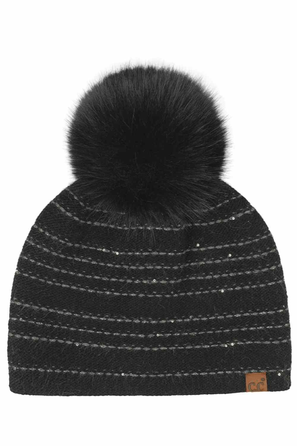 Black C.C Stripe Stitches with Sequin Angora Pom Beanie Winter Hat features cozy stripe stitching with shimmering sequin details and a fluffy angora pom for a chic winter-ready look. Designed with a soft stretch fit, it delivers warmth and comfort while adding a touch of sparkle to cold-weather outfits.
