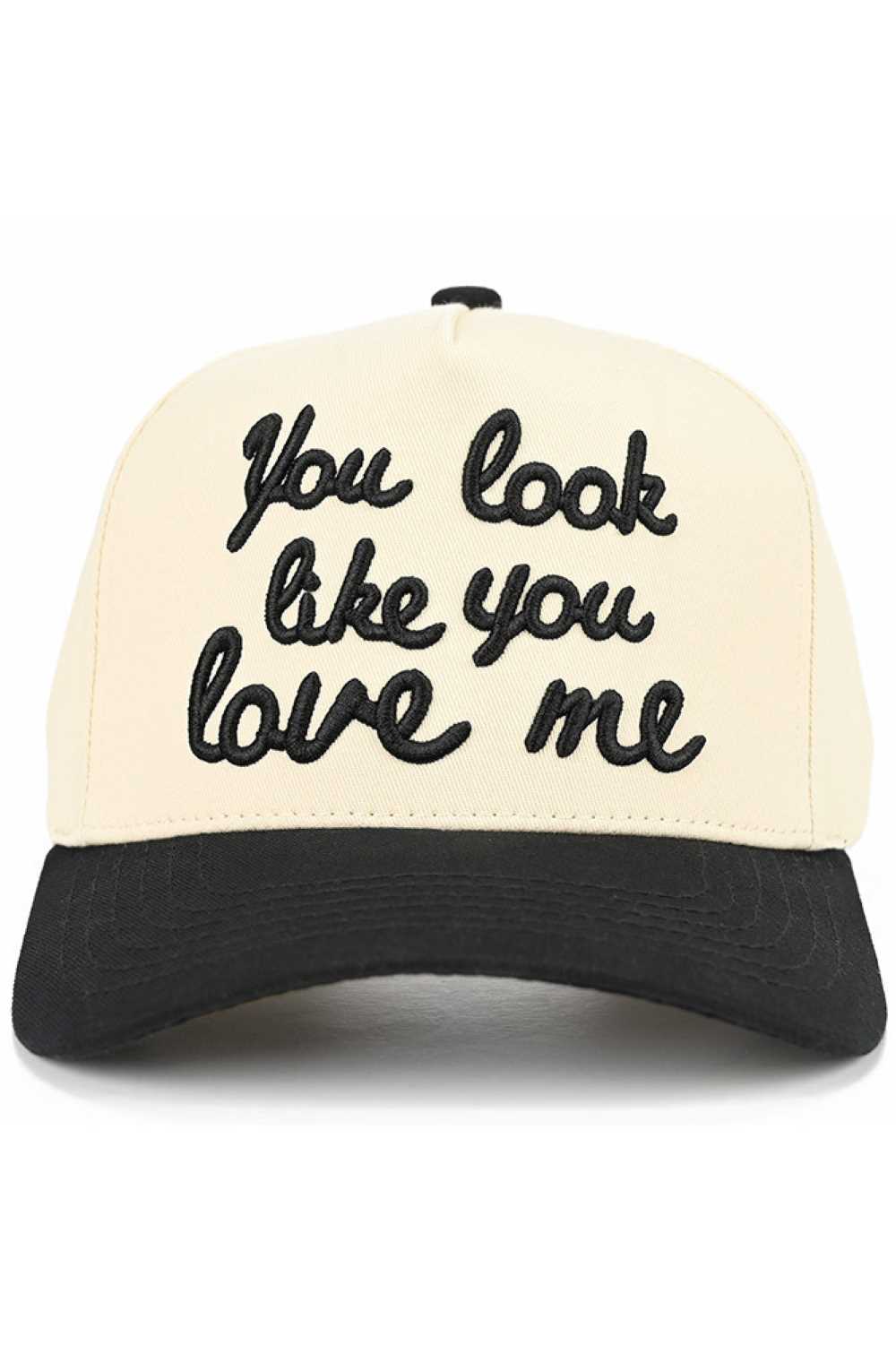 Black Playful and bold, the C.C YOU LOOK LIKE YOU LOVE ME Trucker Hat adds instant personality to any casual outfit with its eye-catching slogan. Designed with a classic snap-back closure and breathable mesh back, it offers a comfortable, adjustable fit perfect for everyday wear.