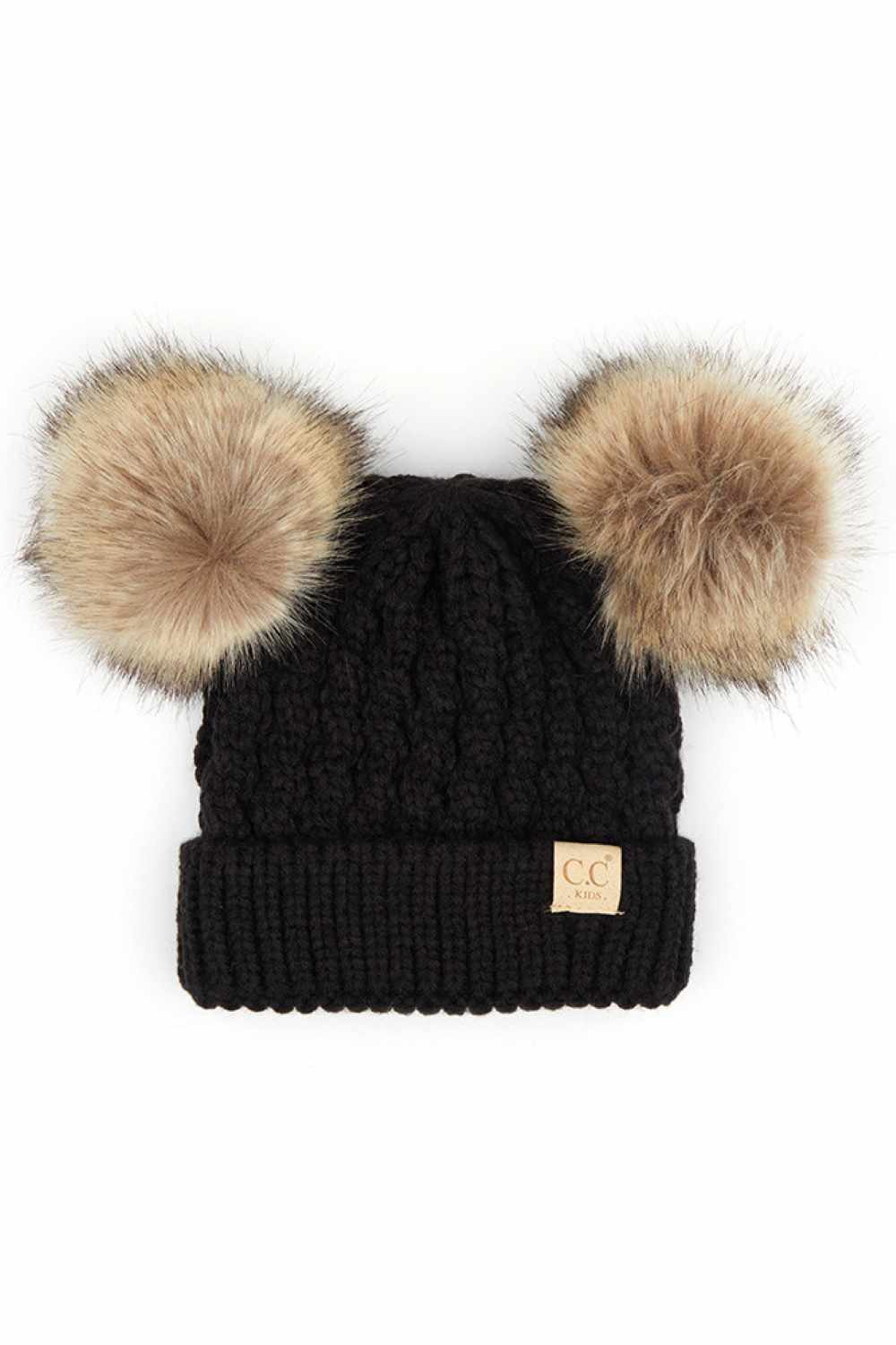 Black Keep your child warm and stylish with this C.C Kids Double Pom Pom Beanie. Featuring an all-over cable knit pattern and dual pom poms for extra charm, it's the perfect accessory for chilly days.