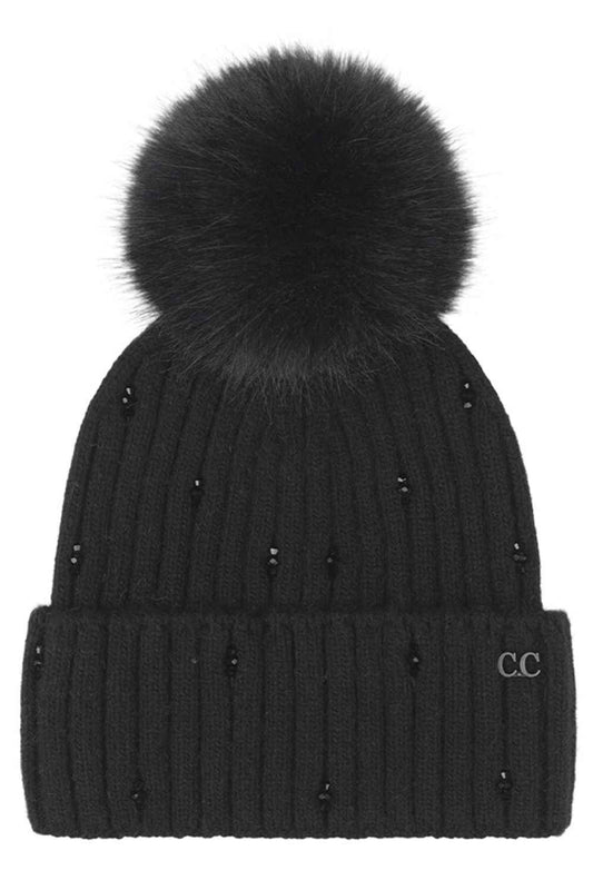 Black C.C Glass Bead Embellishment with Faux Fur Pom Cuff Beanie Winter Hat sparkles with elegant glass bead detailing and is finished with a plush faux-fur pom for a stylish cold-weather look. Crafted with a soft stretch fit, this cozy cuff beanie keeps you warm while adding a touch of glam to your winter outfits.