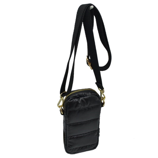 Black Meet your new hands-free essential. The Compact Puffer Crossbody Bag is designed for those days when you only want to carry the absolute basics. Blending streetwear aesthetic with practical utility, this ultra-lightweight bag keeps your most valuable items secure and easily accessible.