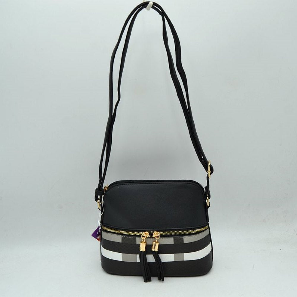 Black This compact crossbody bag features a structured dome silhouette with a smooth upper half and a bold plaid pattern across the lower section, making it an excellent choice for everyday use. It offers multiple storage compartments, including a secure top-zippered main opening and a secondary front-zippered pocket embellished with dual gold-tone pulls and hanging tassels. A long, slender adjustable shoulder strap connects via metallic side rings