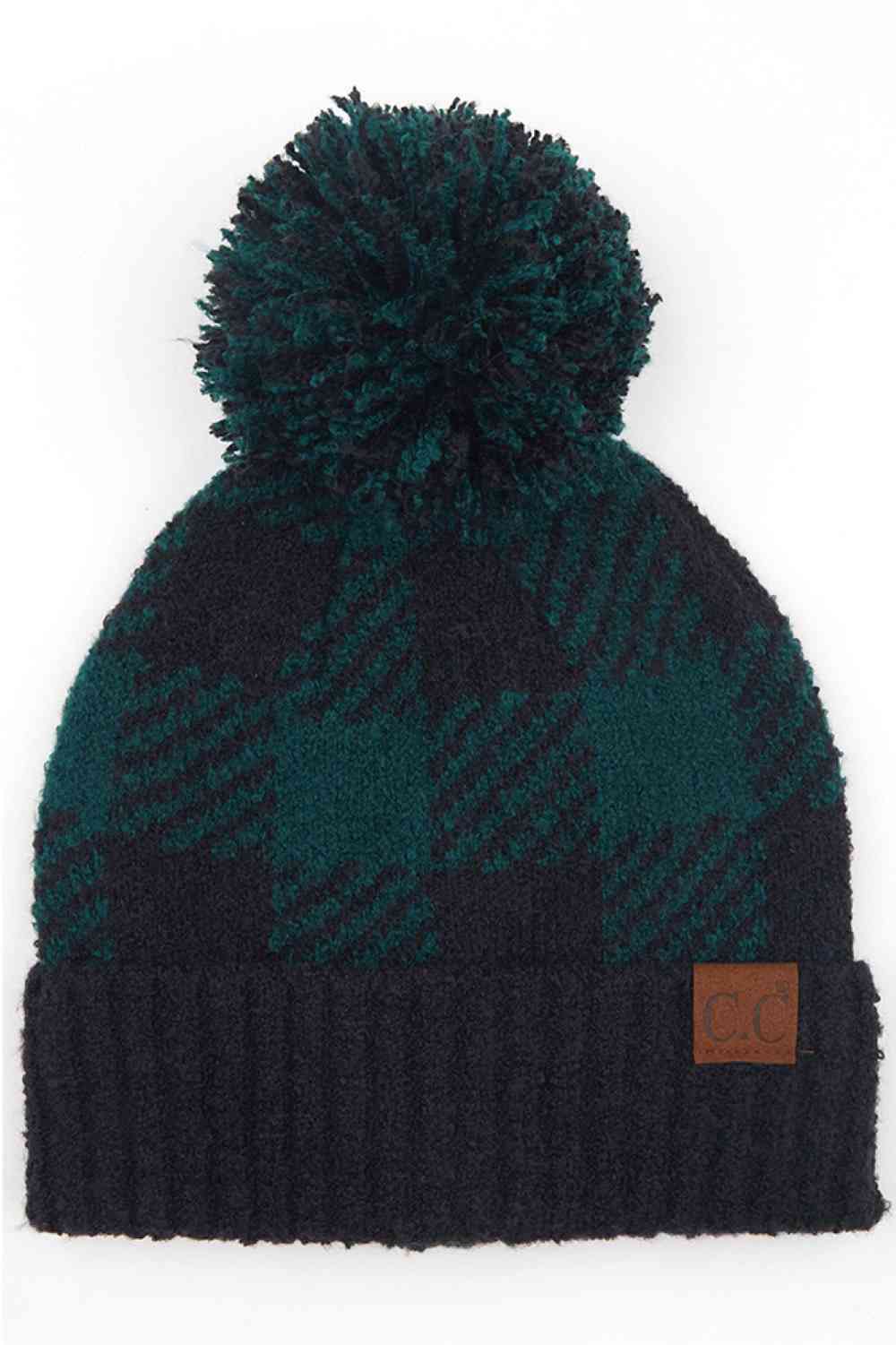Black Deep Pine Elevate your winter wardrobe with this C.C Buffalo Check Jacquard beanie featuring a cozy knit pom-pom. The classic buffalo check pattern adds timeless style to any outfit, whether you're heading outdoors or staying in.