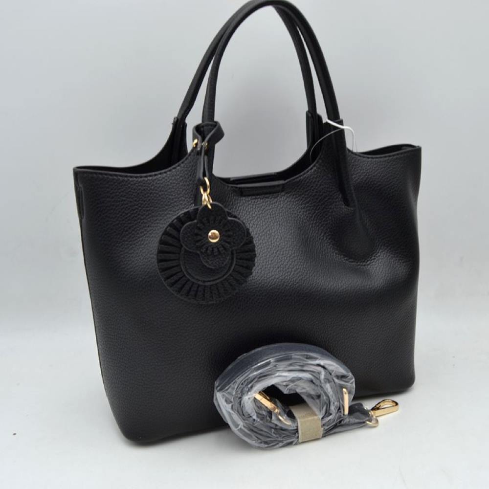 Black Elevate your everyday style with this versatile and sophisticated&nbsp;pebbled tote. Designed for the modern woman who values both form and function, this bag seamlessly transitions from a professional office setting to a casual weekend outing.