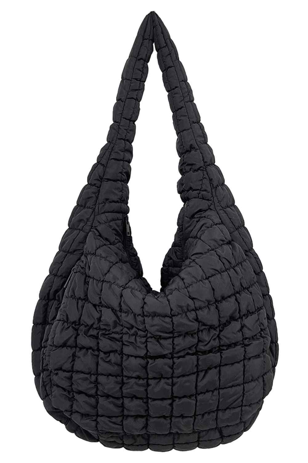 Black Spacious quilted bag designed for everyday carry and travel. Features a durable 100% polyester construction with a quilted exterior for added protection and style. Generous dimensions of 17.7" x 19.7" x 8.7" provide ample room for essentials, making it perfect for shopping, work, or weekend getaways. Lightweight and easy to maintain. Made in China.