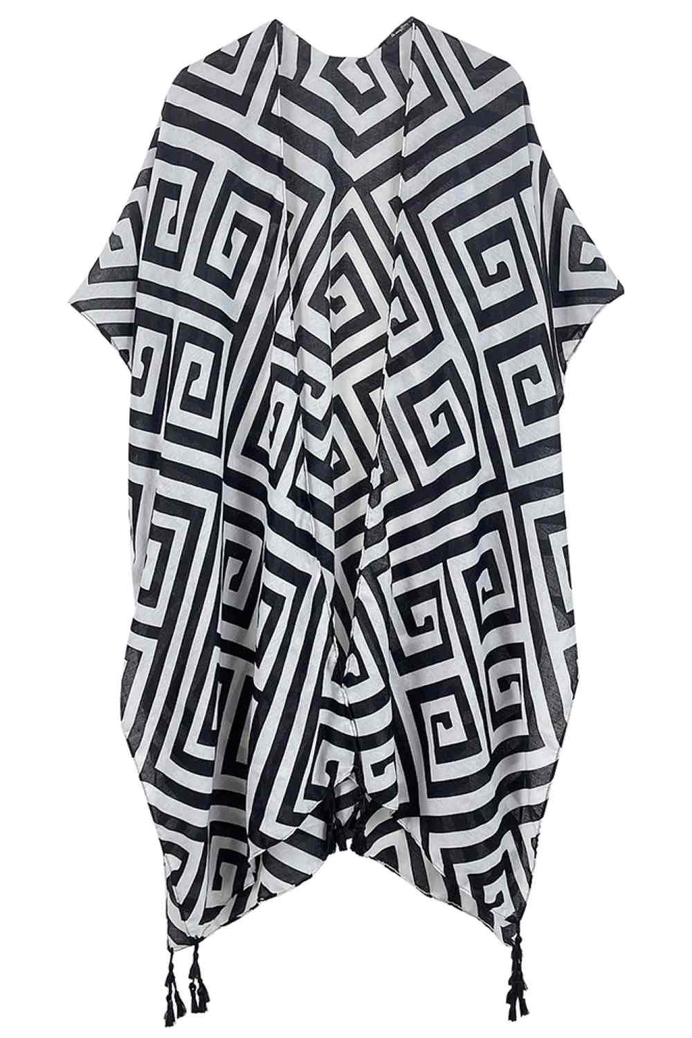 Black Elevate your wardrobe with this stunning Geometric Pattern Print Tassel Kimono. Crafted from 100% polyester, this lightweight piece features a bold geometric design and decorative tassels for an effortless, bohemian-inspired look. Perfect for layering over dresses, tanks, or casual outfits, it adds instant style and dimension to any ensemble. With generous dimensions of 35.4" x 35.4", it drapes beautifully on all body types. Ideal for beach days, festivals, or relaxed everyday wear.