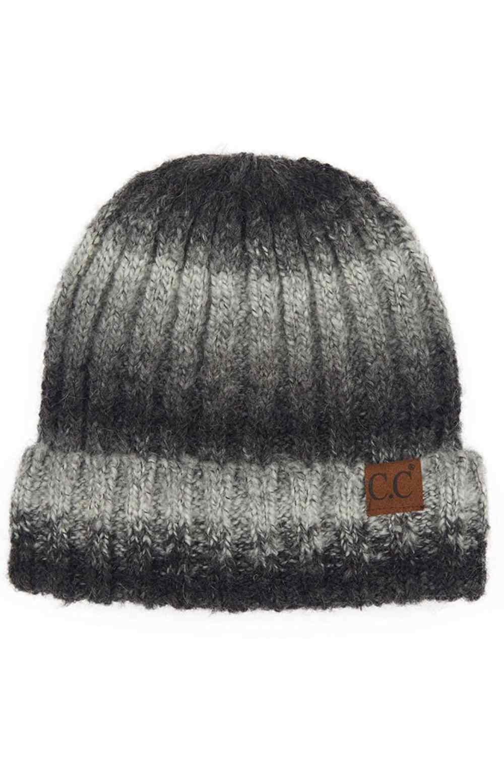 Black Gray Wrap up in warmth with this C.C Ombre Knit Beanie featuring a comfortable cuff design. Crafted from a premium blend of 65% acrylic, 25% nylon, and 10% spandex, this beanie delivers softness and stretch for an ideal fit.