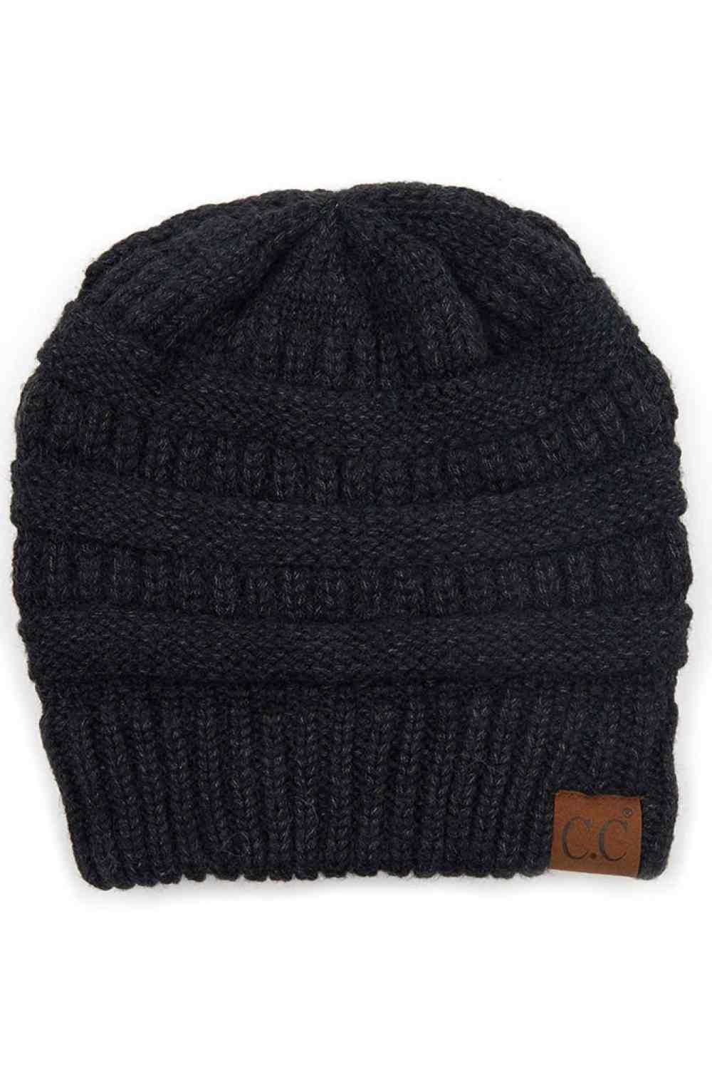 Black Wrap yourself in softness with this C.C Soft Yarn Knit Beanie, crafted from a premium blend of 47% rayon, 31% PBT, and 22% nylon. The luxurious rayon provides a silky feel against your skin, while the durable synthetic fibers ensure lasting wear through winter season.
