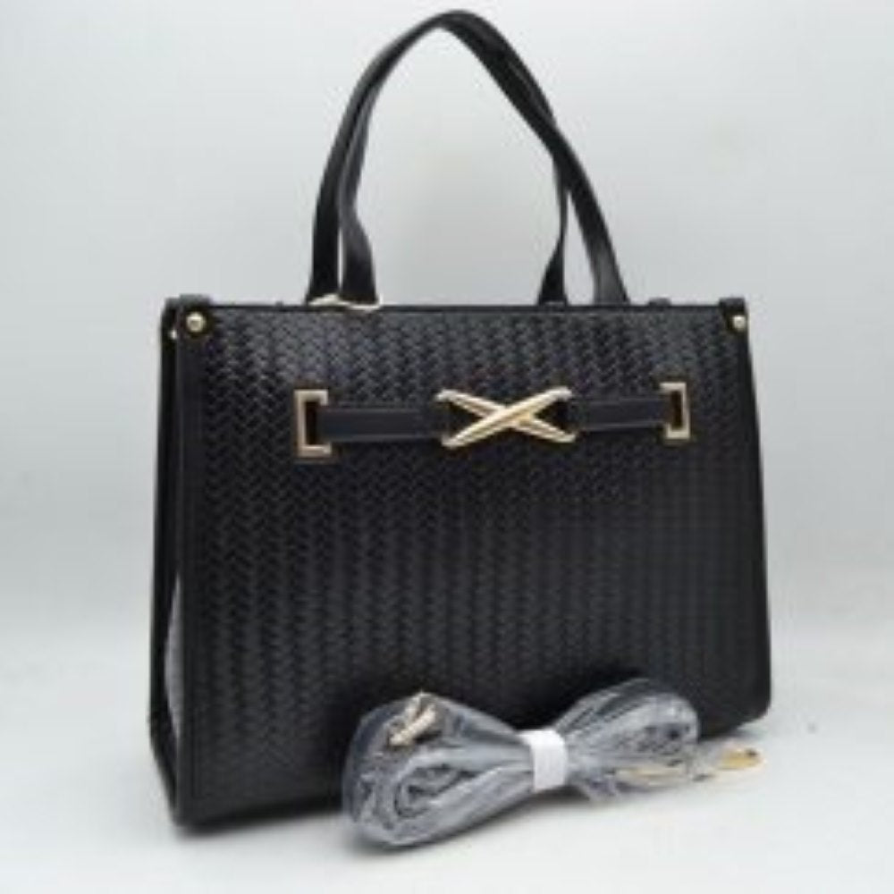 Black This sophisticated everyday tote bag features a structured rectangular silhouette with an all-over classic basket-weave textured design in a clean beige tone. The front panel is elegantly accented by a matching faux-leather strap detailed with a polished, gold-toned 'X' shaped decorative buckle. Designed for organized professional or daily use, the main compartment is fitted with double slim top handles for comfortable hand or arm carrying.