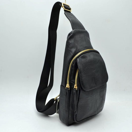 Black Streamline your daily commute or weekend adventures with this sleek and functional sling backpack. Designed with a contemporary teardrop silhouette, this multi-compartment pack offers efficient organization without sacrificing style. The exterior features a subtly crinkled, textured finish that delivers a rugged yet sophisticated look. Multiple zippered compartments are accented with heavy-duty, polished metallic zippers