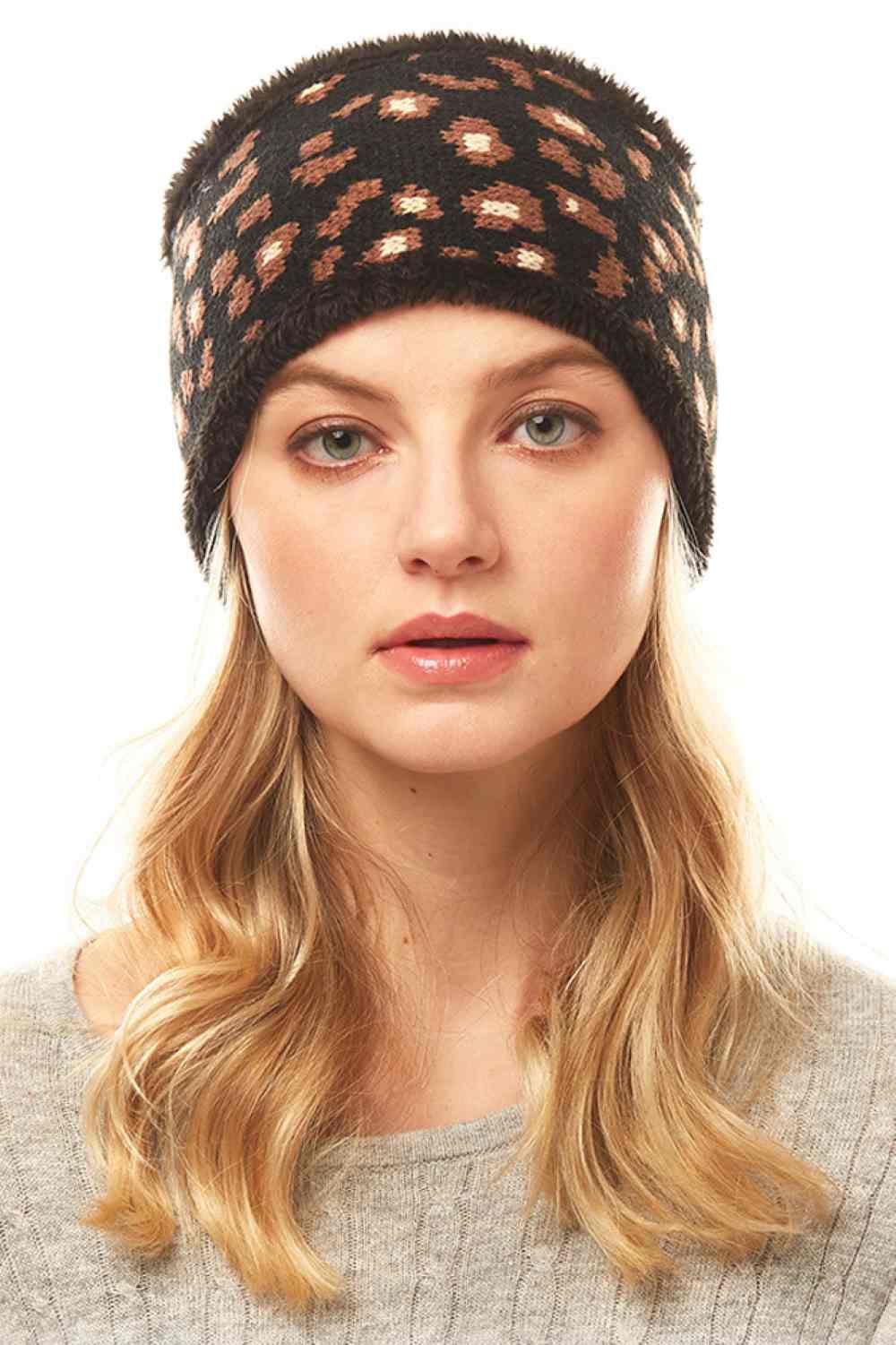 Black Stay stylish with this eye-catching Leopard Print Headband. Crafted from a comfortable blend of 50% polyester and 50% acrylic, this versatile accessory measures 4" x 10" and fits one size. Perfect for keeping hair in place while adding a bold fashion statement to any outfit. Whether you're heading to the gym, running errands, or just want an instant style upgrade, this headband delivers both function and flair.