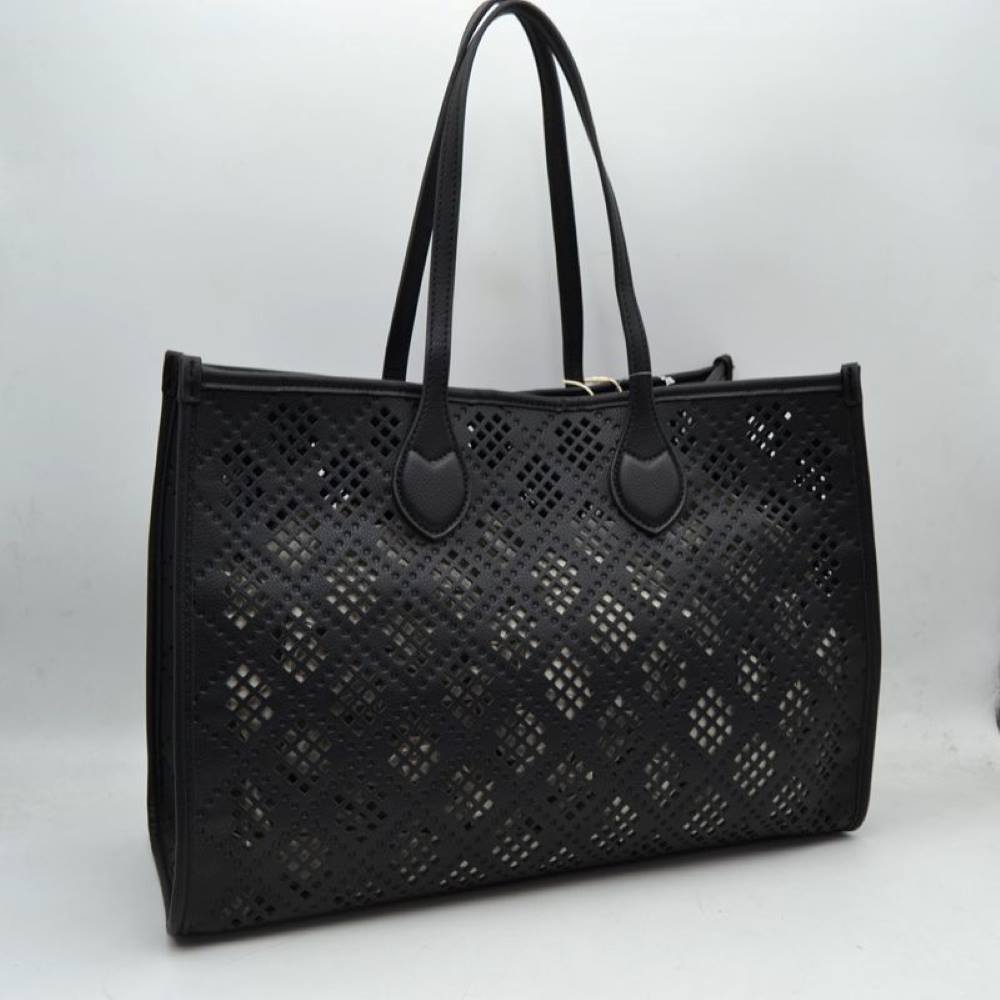 Black Elevate your accessory game with this stunning black perforated tote. Combining architectural precision with everyday practicality, this bag features an intricate laser-cut lattice design that offers a modern, airy feel while maintaining a structured, high-end silhouette. Whether you're heading to a business meeting or a weekend brunch, this versatile tote is the perfect blend of edgy detail and classic sophistication.
