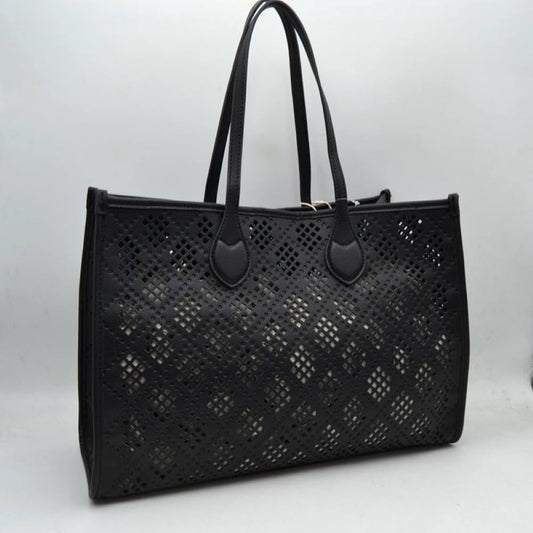 Black Elevate your accessory game with this stunning black perforated tote. Combining architectural precision with everyday practicality, this bag features an intricate laser-cut lattice design that offers a modern, airy feel while maintaining a structured, high-end silhouette. Whether you're heading to a business meeting or a weekend brunch, this versatile tote is the perfect blend of edgy detail and classic sophistication.