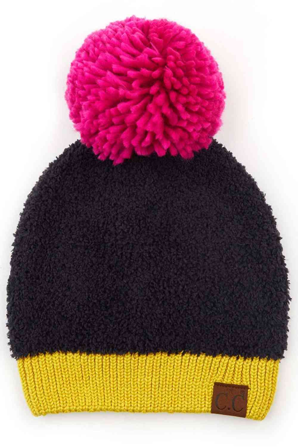Black Multi Stay warm and stylish with this C.C Knitted Sherpa Beanie, designed with a soft sherpa lining and contrasting color accents. The cozy knit construction combines 50% acrylic and 50% polyester for durability and comfort through chilly seasons.