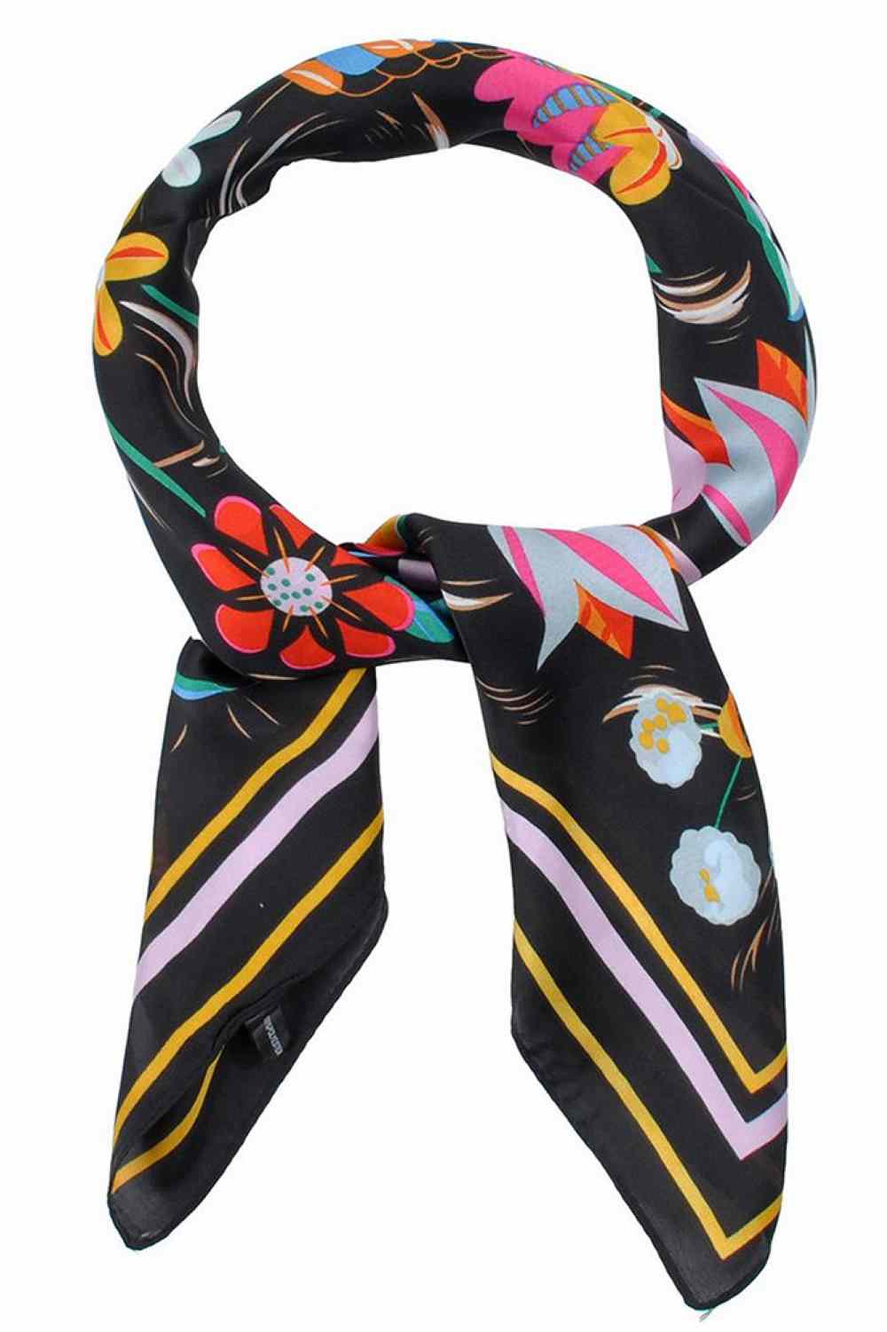 Black Brighten your summer style with this lightweight bandana scarf featuring vibrant multi-color flowers and playful color-striped edges. Crafted from 100% polyester, it's breathable and perfect for warm weather wear. The generous 27.5" x 27.5" square size offers versatility—wear it as a headscarf, neck wrap, or accessory. Easy to care for and designed for everyday comfort, this cheerful piece adds a pop of color to any outfit.