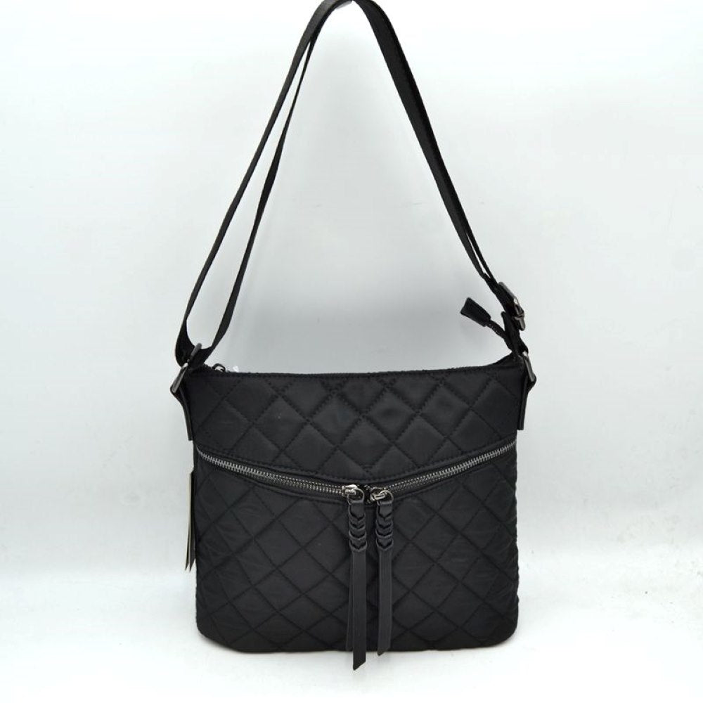 Black This casual crossbody bag features a classic diamond quilted design and a slim, flexible profile tailored for everyday use. It offers multiple functional storage compartments, including a main upper zippered area and a distinct, gently curved horizontal front pocket equipped with dual center-closing zipper pulls that feature long, matching fringe extensions. A long, integrated adjustable shoulder strap ensures comfortable carrying over the shoulder or across the body.