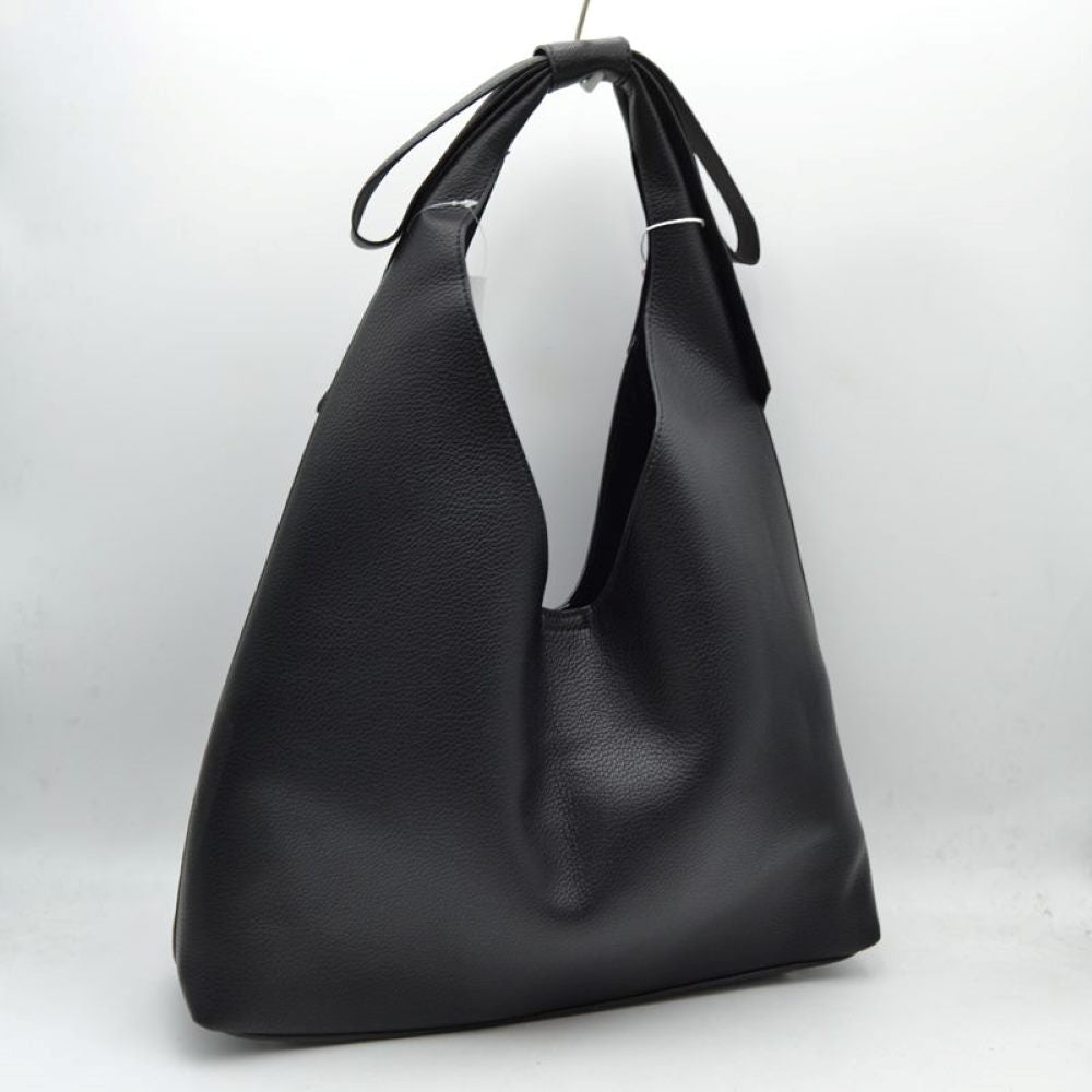 Black This everyday shoulder bag features a distinctive slouchy silhouette with a wide, integrated strap that is elegantly tied at the top. The spacious open-top main compartment offers effortless access to your daily essentials, while the clean design showcases a subtly textured exterior surface. Designed for comfortable over-the-shoulder wear, this versatile piece combines a modern aesthetic with practical, everyday functionality.