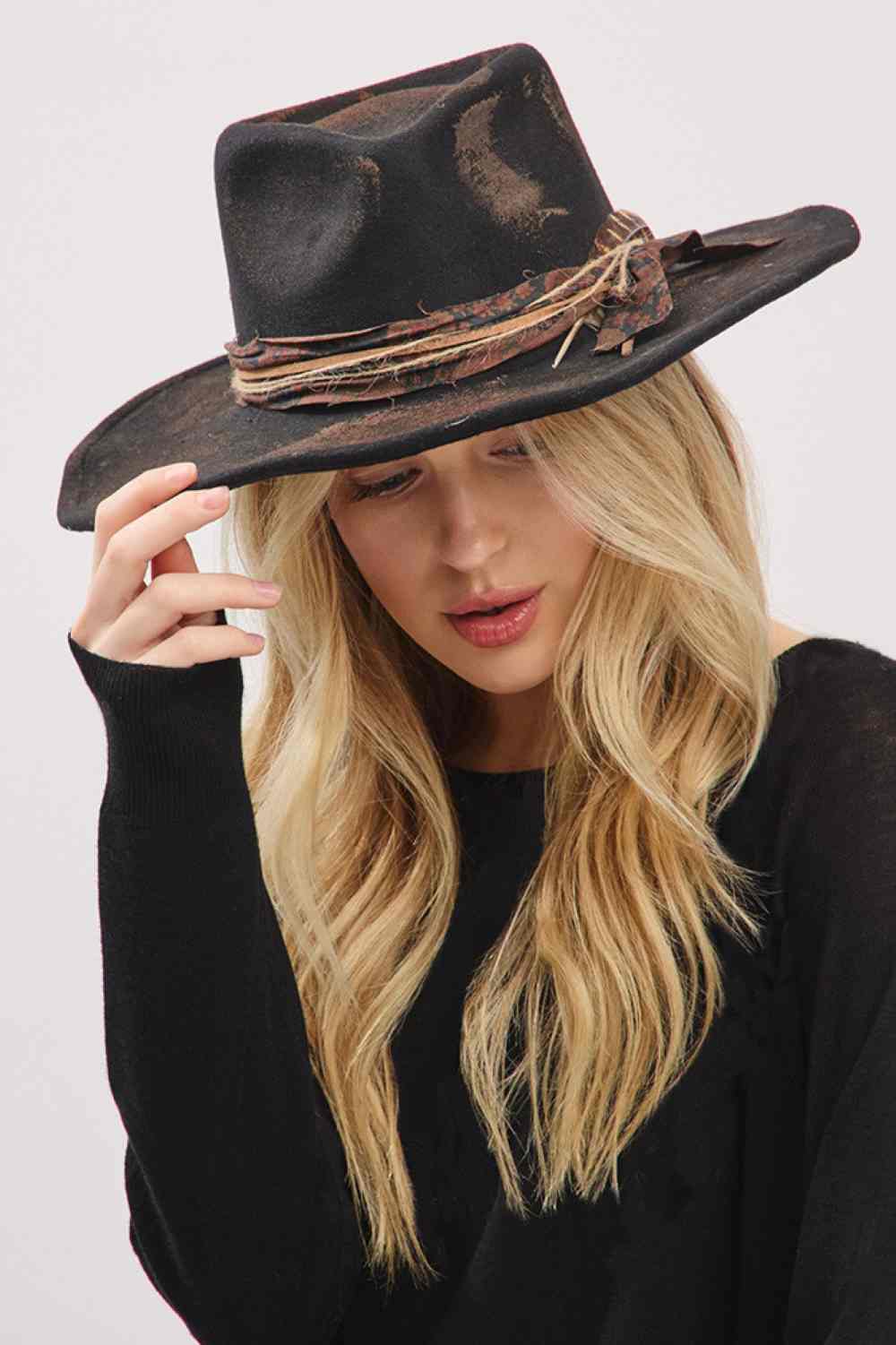 Black Two iconic looks, one hat! This Cowboy Hat's flexible brim allows for effortless shaping, letting you wear it as a classic cowboy hat or style it as a contemporary fedora.